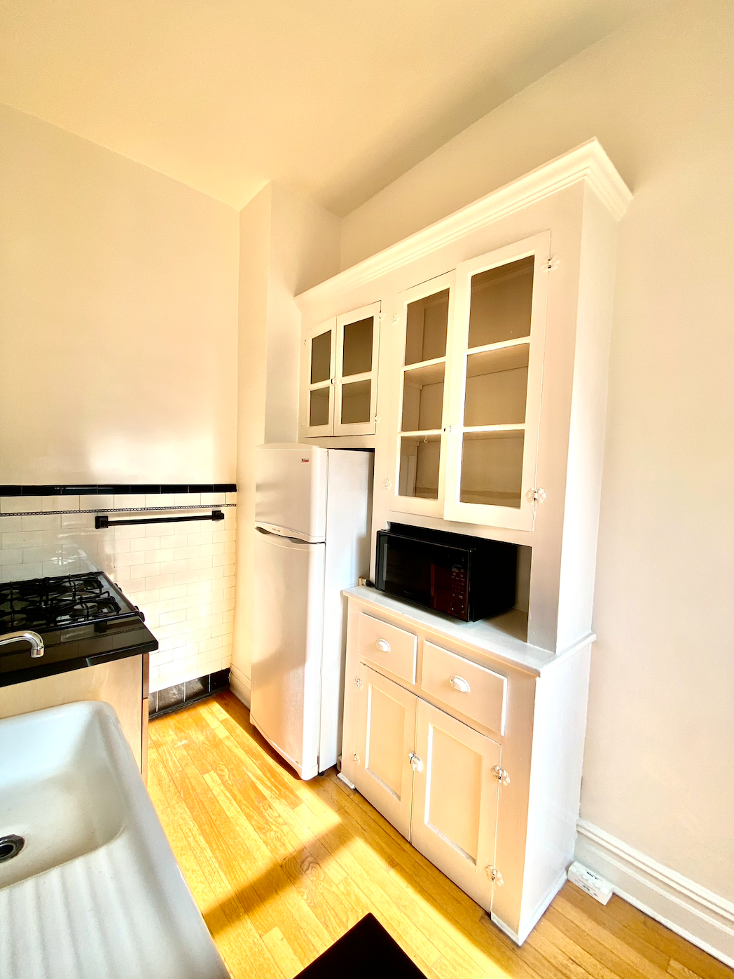 121 7th Avenue, Unit 3R Brooklyn, NY 11215 - Photo 5 of 7 a view of a kitchen with a sink and cabinets