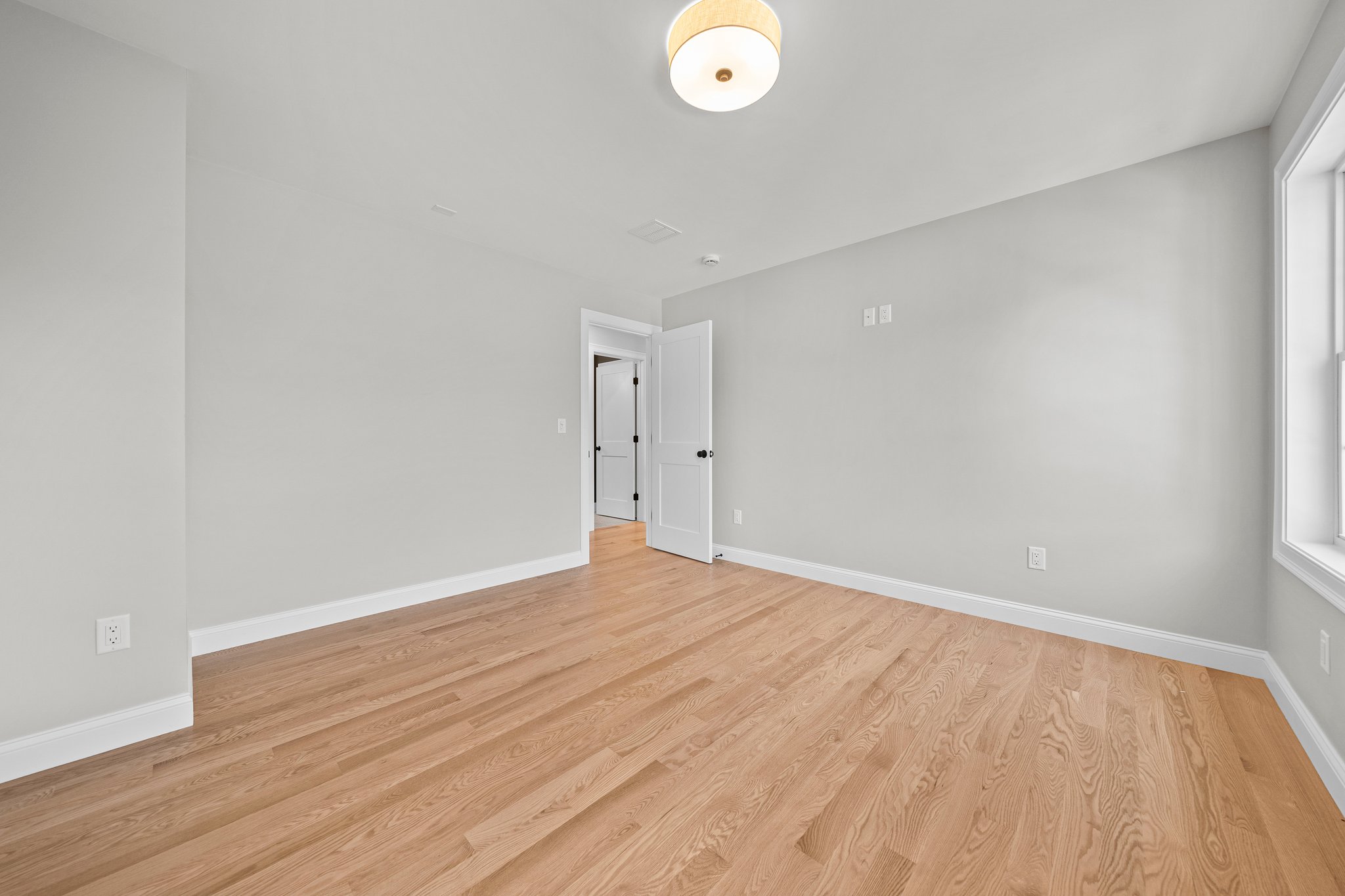 3 Everendon Road Canton, MA 02021 - Photo 25 of 35 a view of an empty room and wooden floor