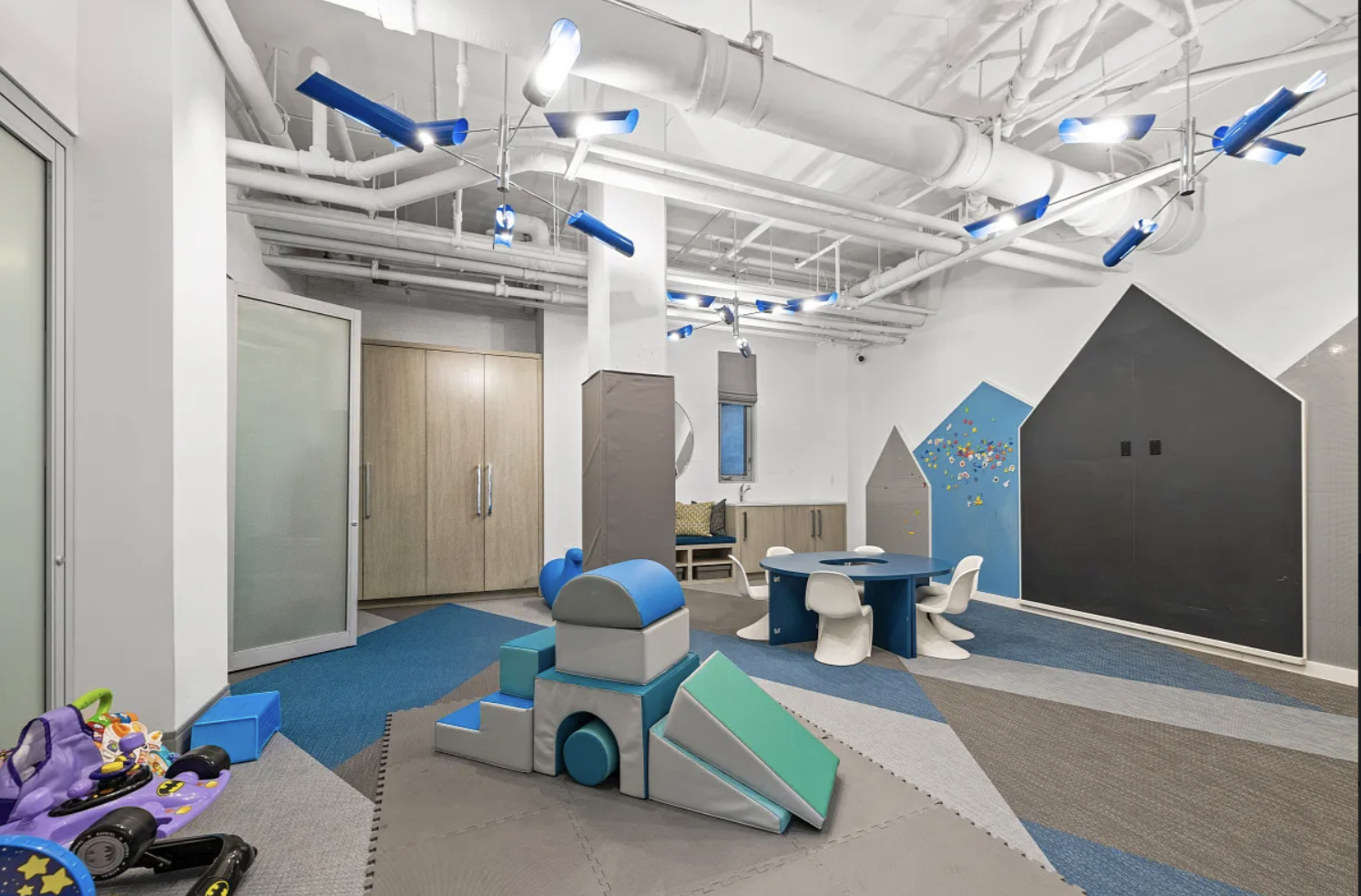 2 5th Avenue, Unit 2R Manhattan, NY 10011 - Photo 10 of 12 a living room filled with furniture