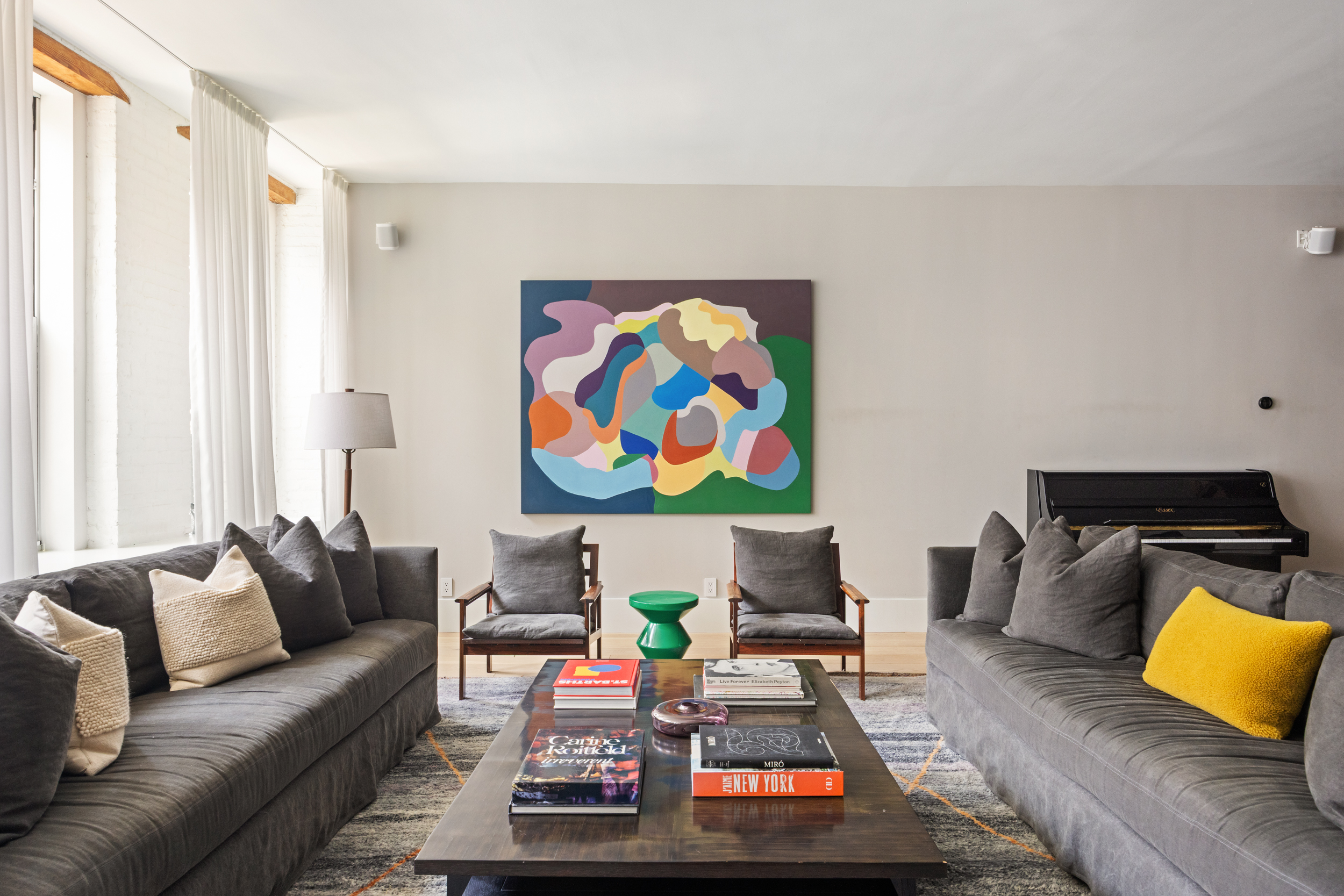 622 Greenwich Street, Unit 4B Manhattan, NY 10014 - Photo 9 of 27 a living room with furniture and a couch