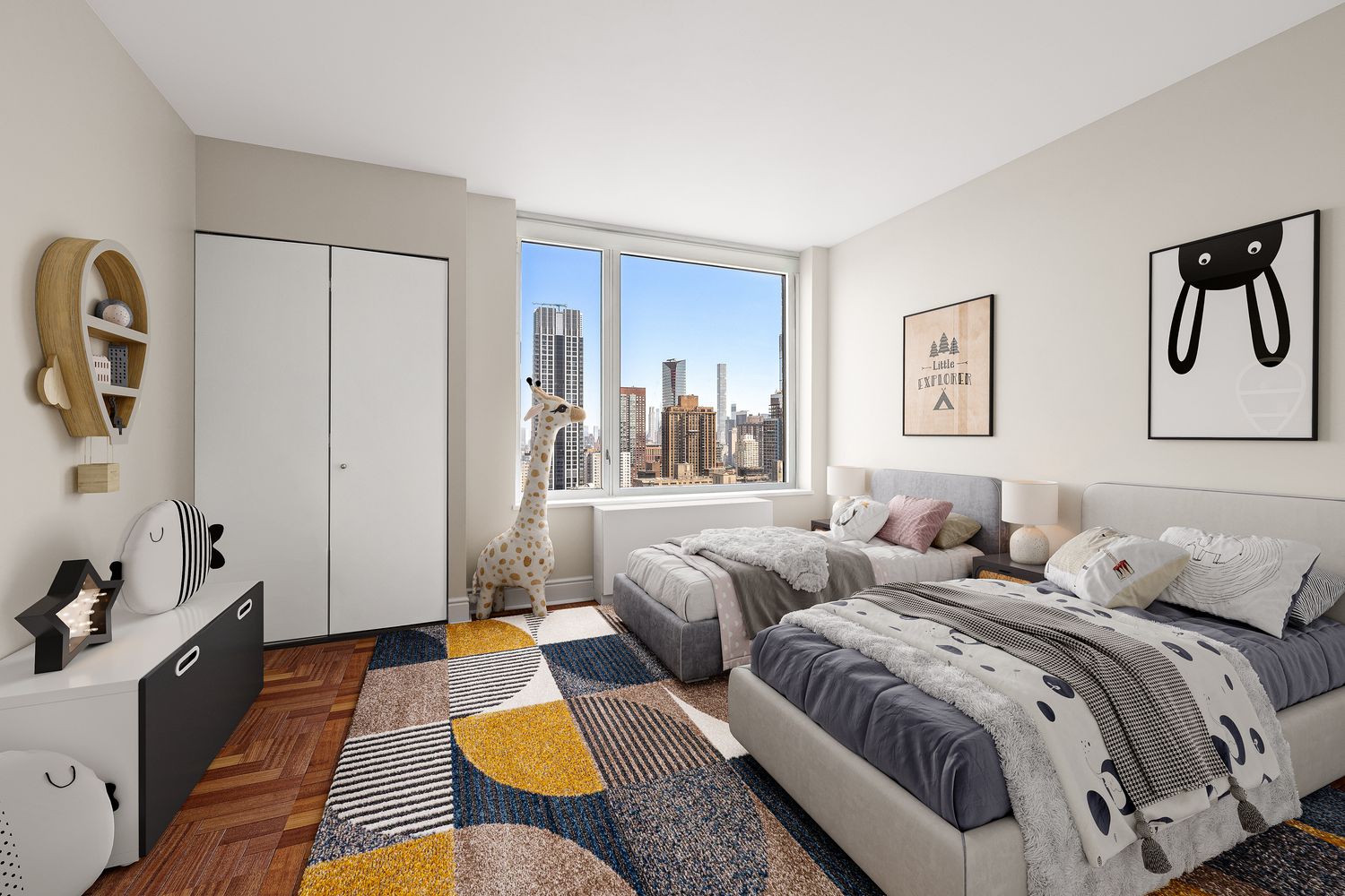 a bedroom with two beds and a couch