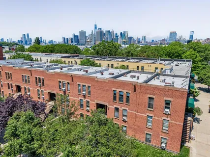 a view of a city with tall buildings