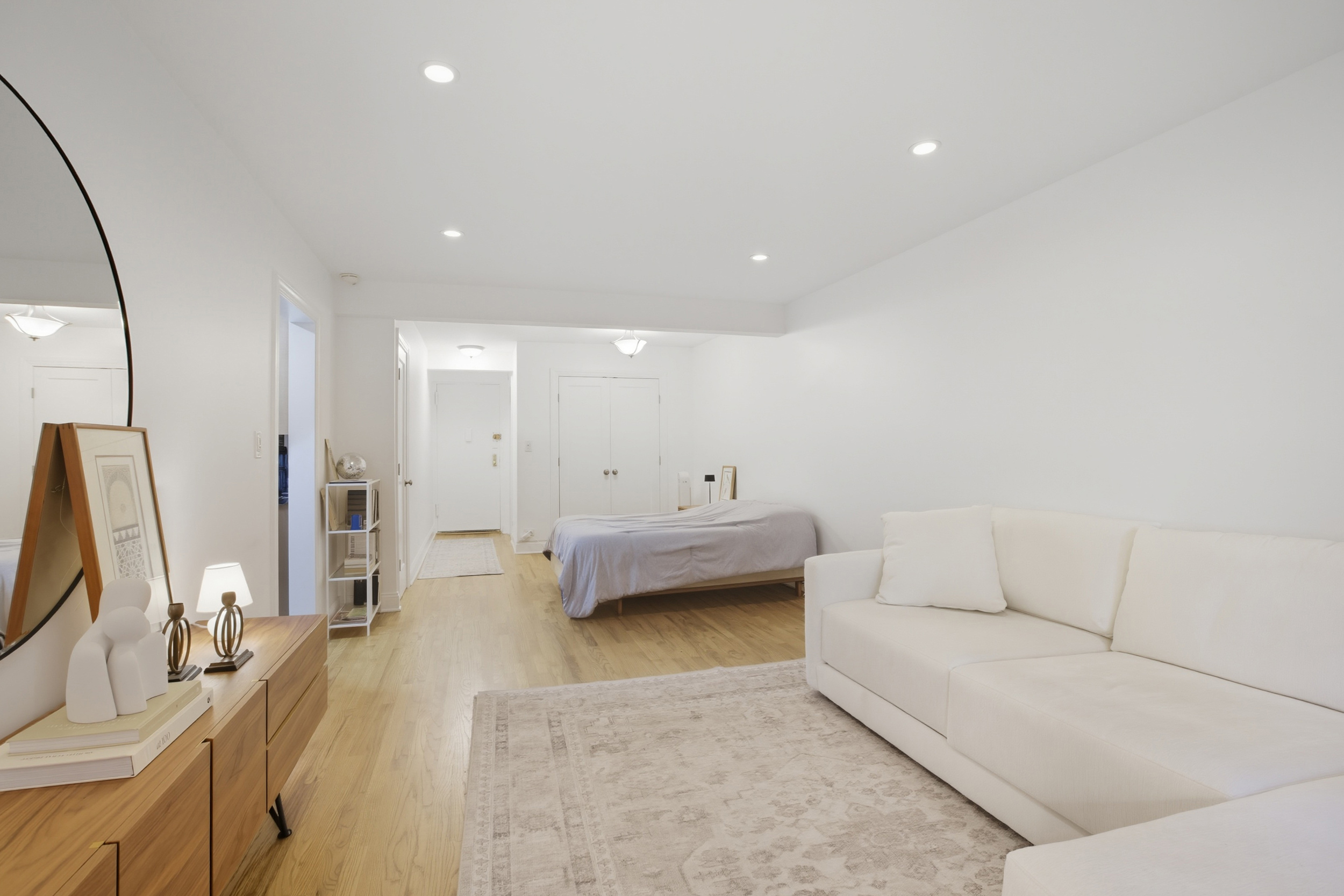 130 Hicks Street, Unit 1E Brooklyn, NY 11201 - Photo 5 of 12 a living room with furniture and a flat screen tv