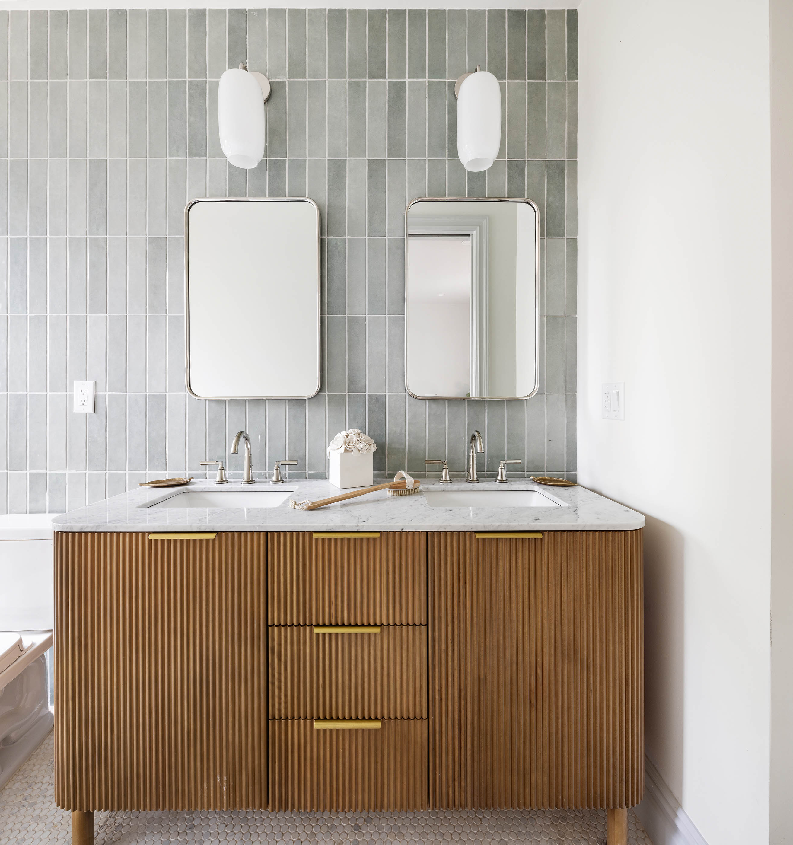 647 Macon Street Brooklyn, NY 11233 - Photo 12 of 20 a bathroom with a sink vanity and mirror