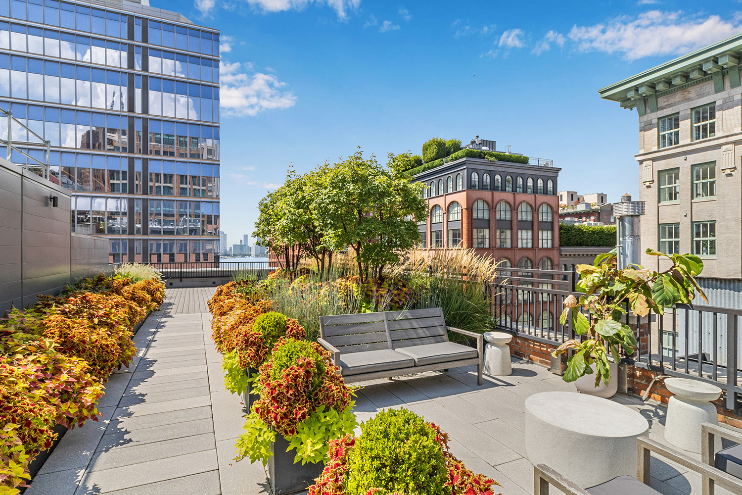 15 Hubert Street, Unit 2C Manhattan, NY 10013 - Photo 12 of 15 a view of a patio with couches and table and chairs and potted plants