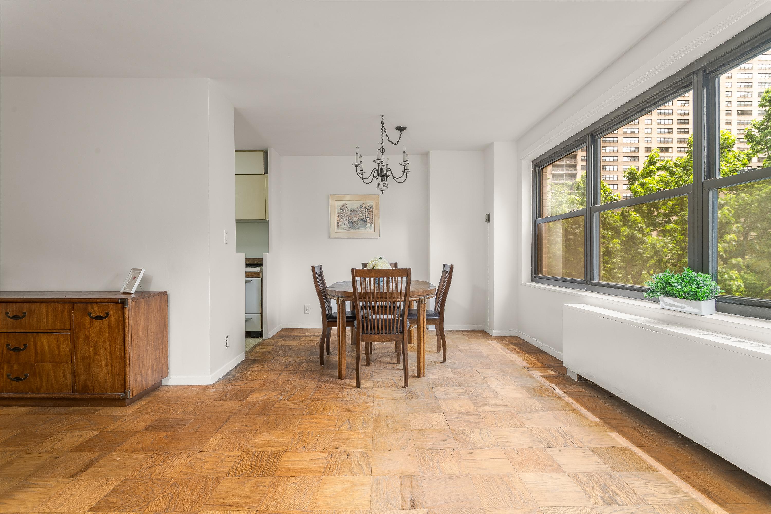 180 West End Avenue, Unit 5H Manhattan, NY 10023 - Photo 6 of 18 a dining room with furniture and window