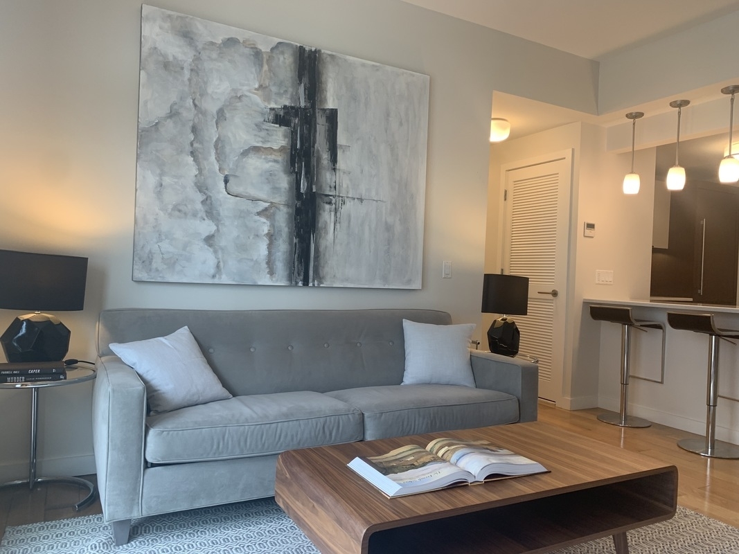 548 4th Avenue, Unit 4B Brooklyn, NY 11215 - Photo 6 of 22 a living room with furniture and a table