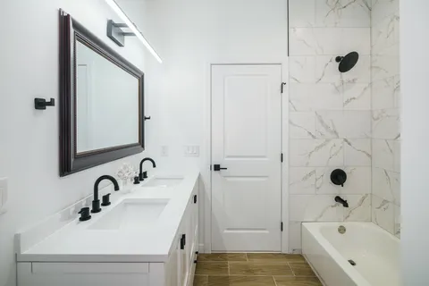 a bathroom with a sink and a bathtub