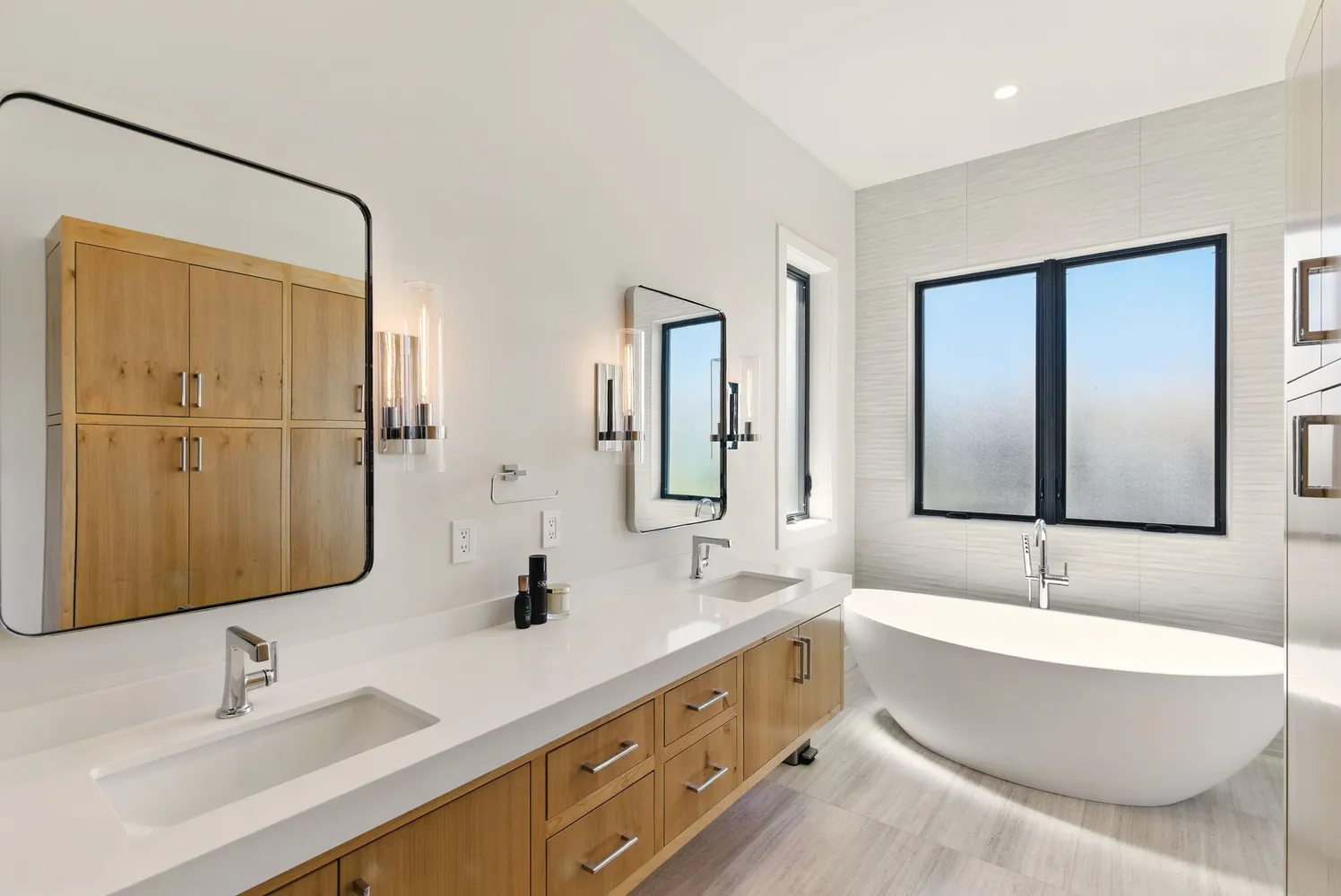 a bathroom with a tub and a sink