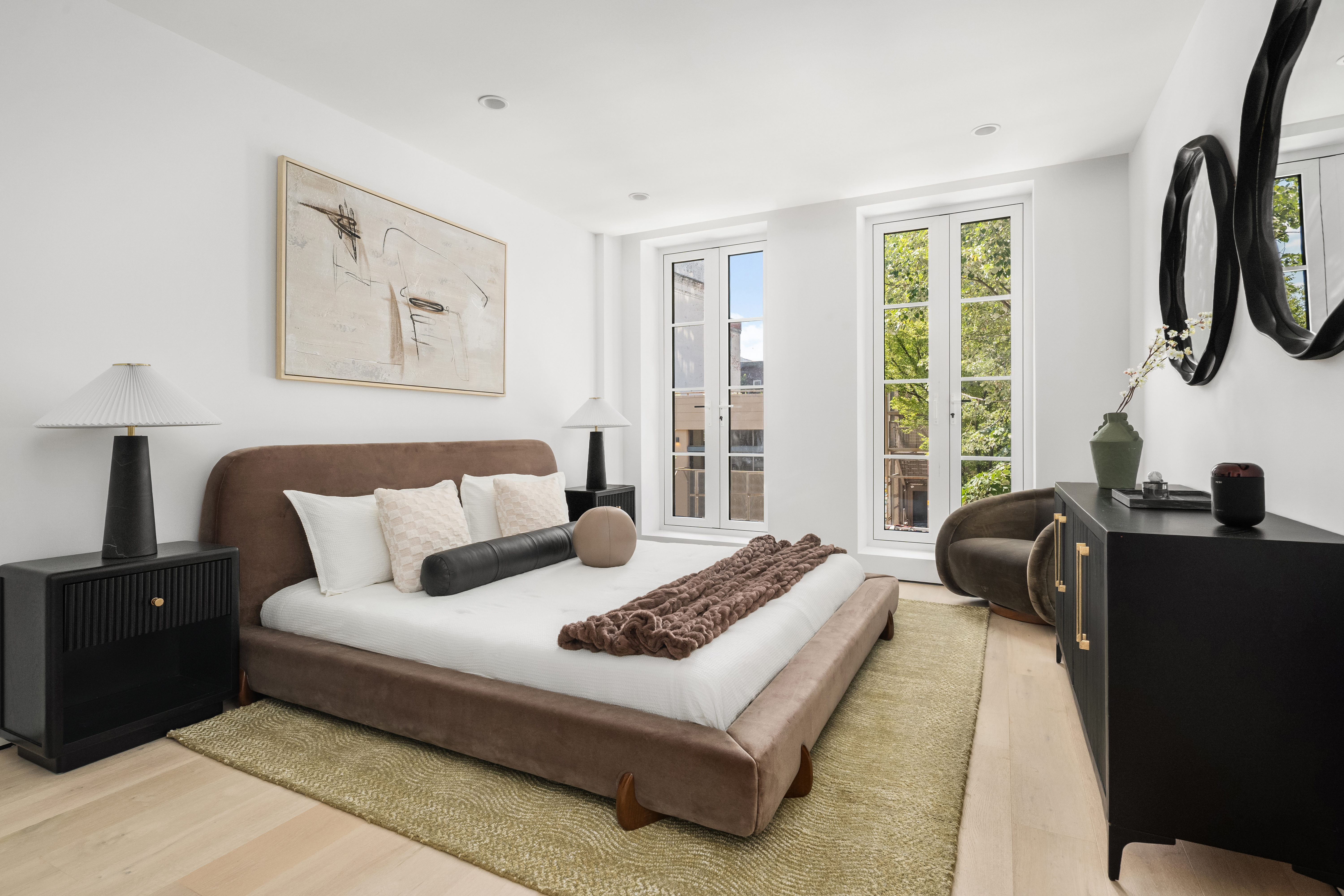 79 South 2nd Street Brooklyn, NY 11249 - Photo 7 of 14 a bedroom with bed and a window