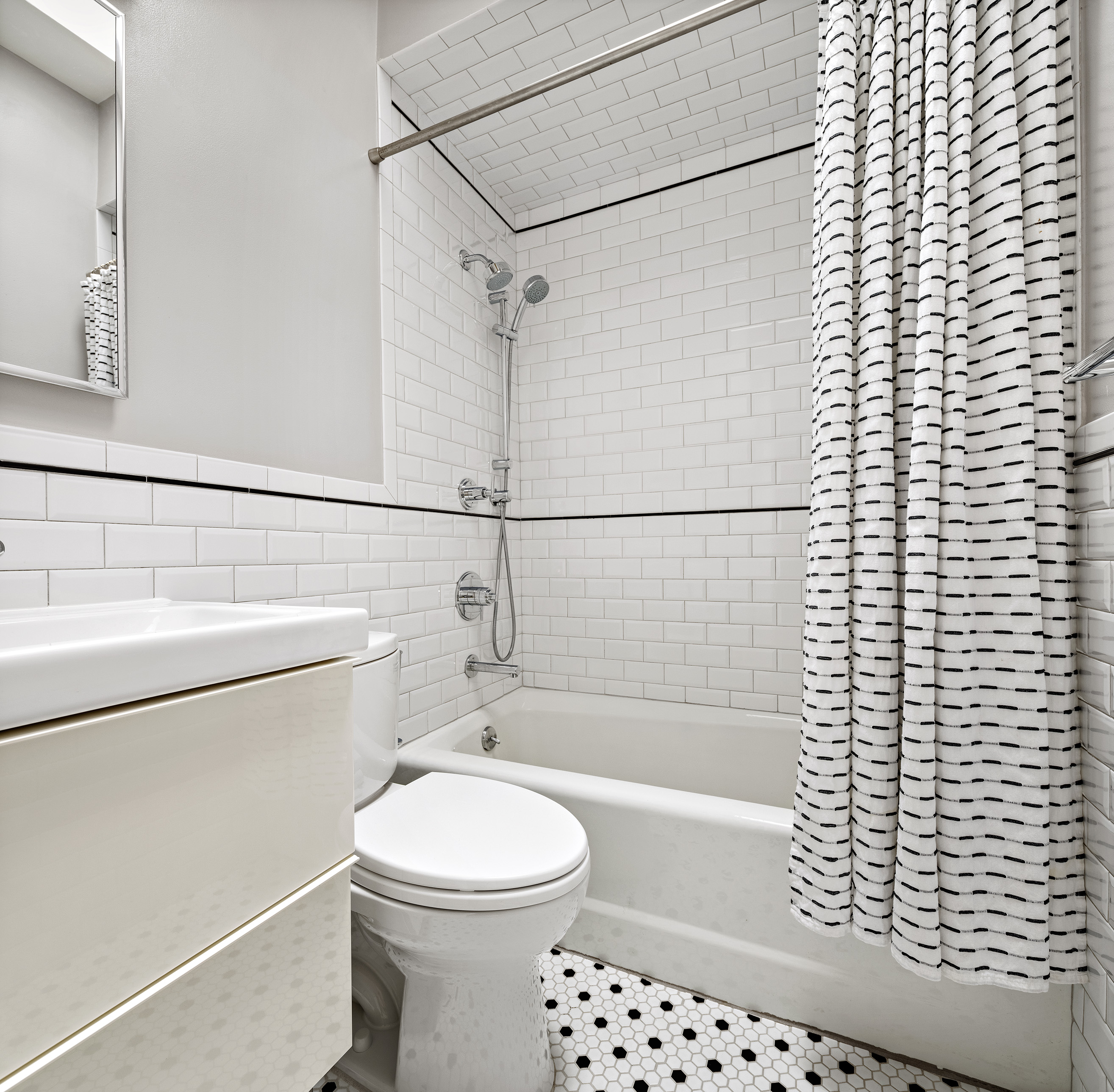 454 12th Street, Unit 3 Brooklyn, NY 11215 - Photo 10 of 18 a bathroom with a shower a toilet and sink