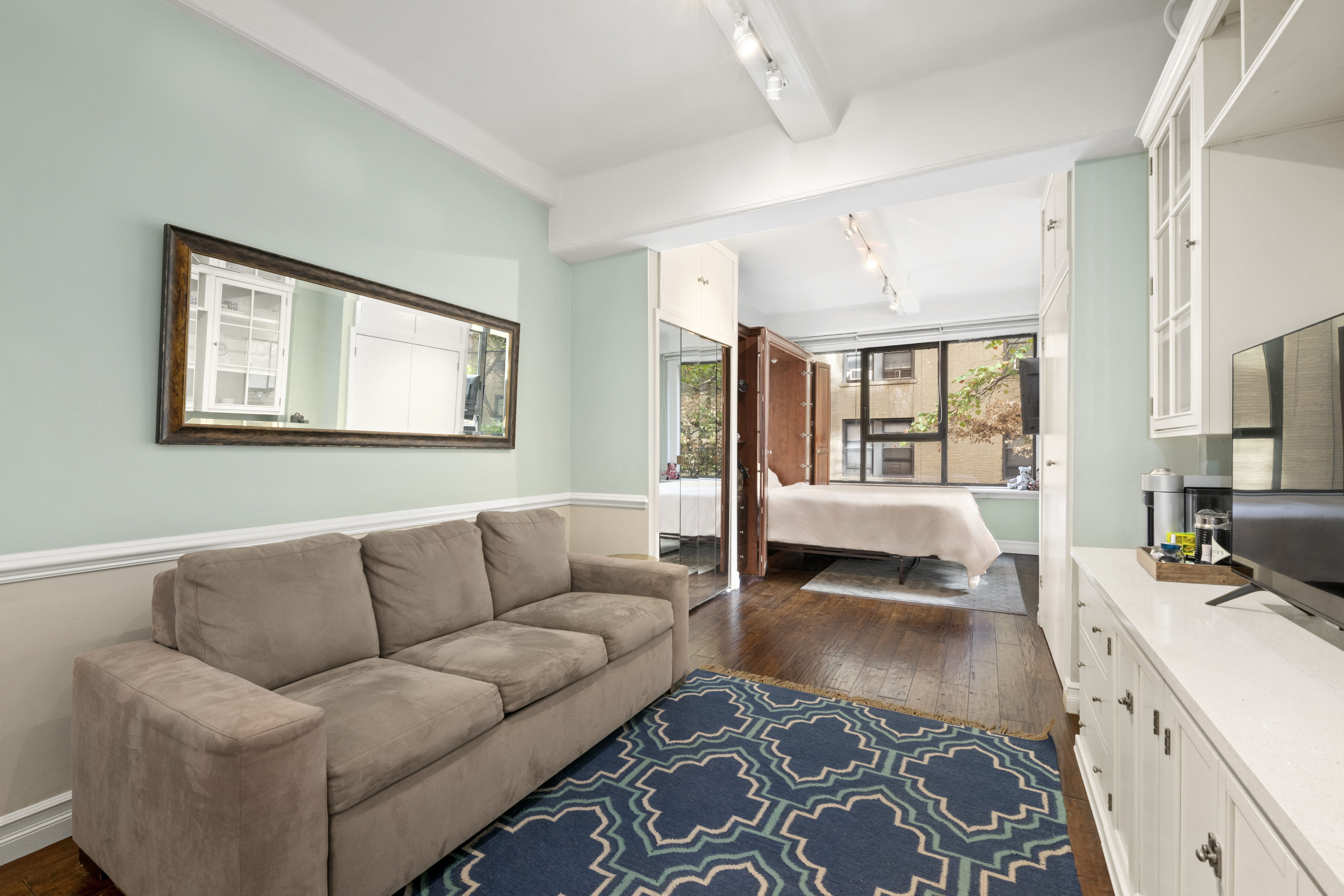 a living room with furniture and a couch