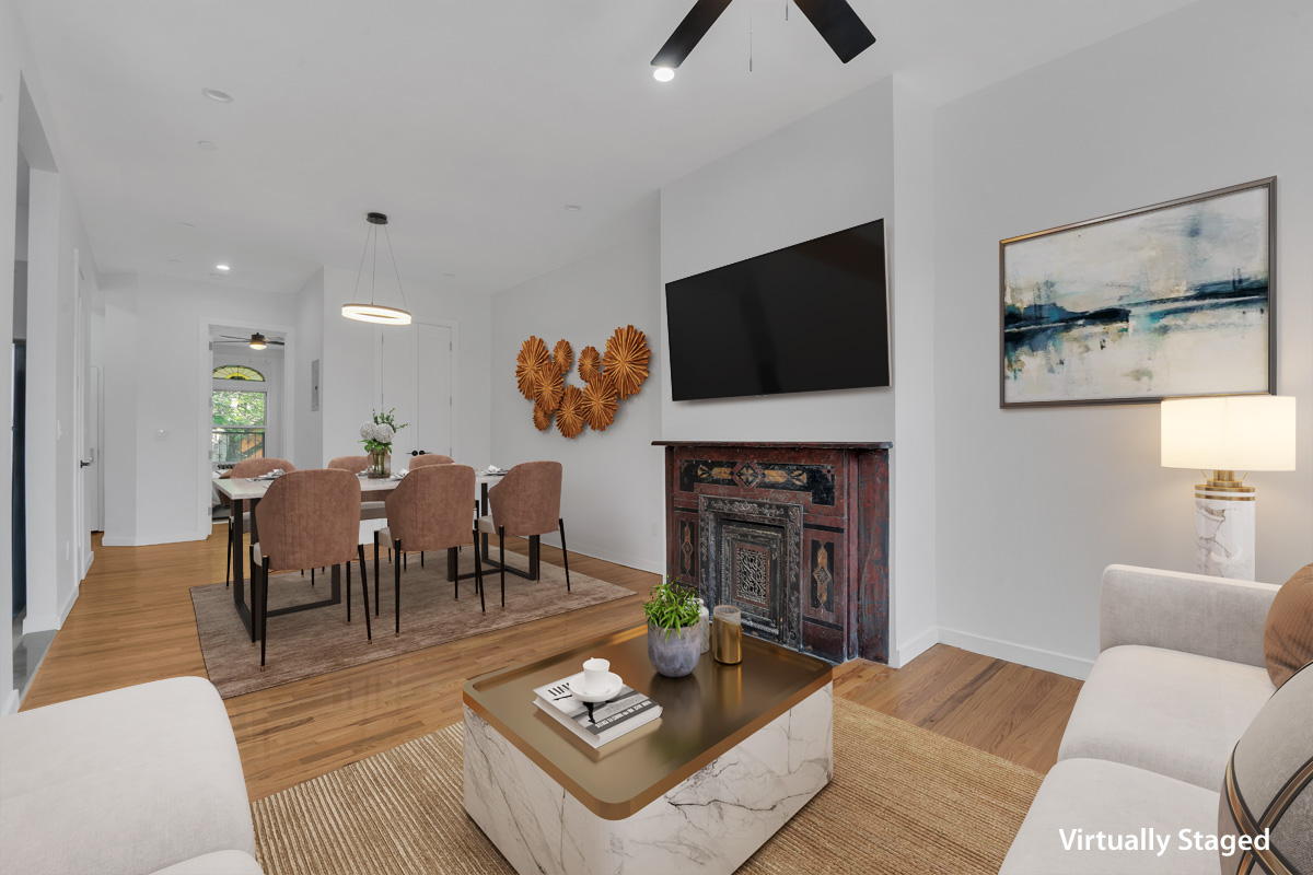1275 Jefferson Avenue, Unit 2 Brooklyn, NY 11221 - Photo 1 of 11 a living room with furniture a fireplace and a flat screen tv