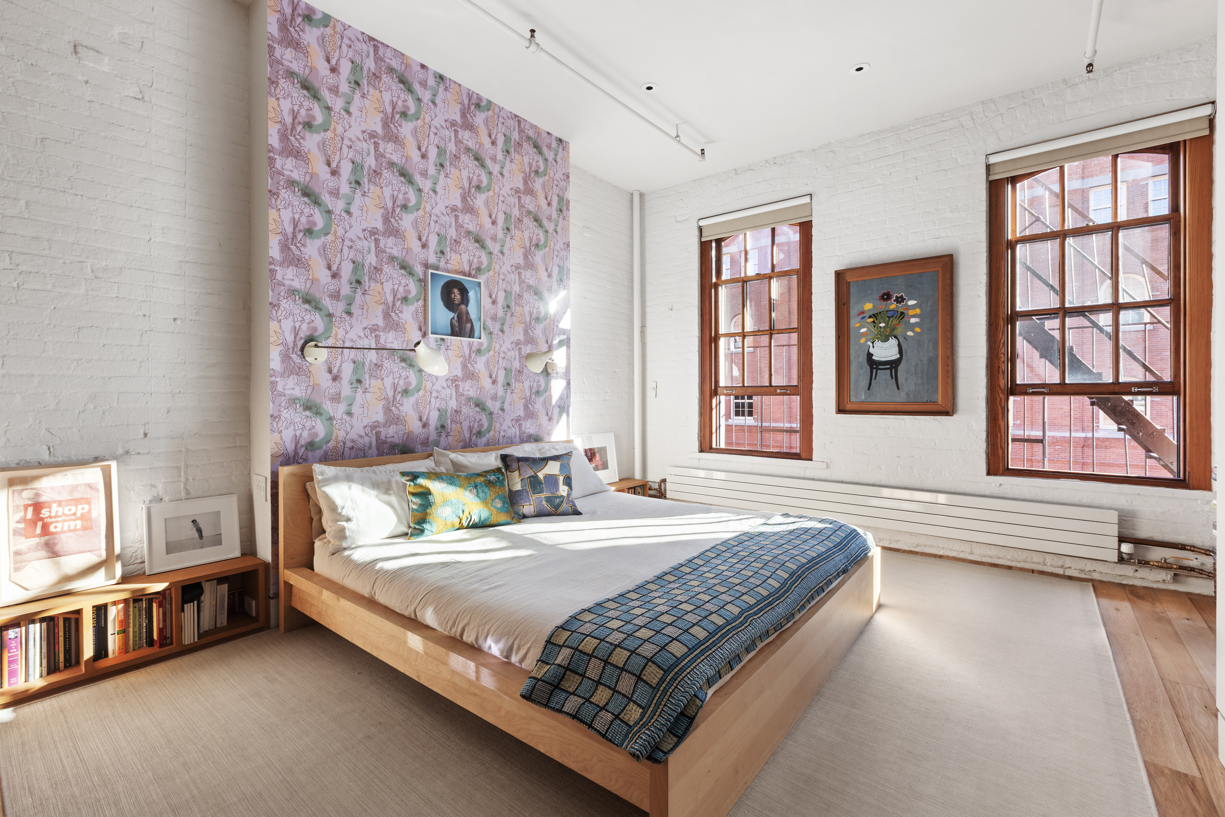 463 Greenwich Street Manhattan, NY 10013 - Photo 9 of 24 a bedroom with a bed dresser and window