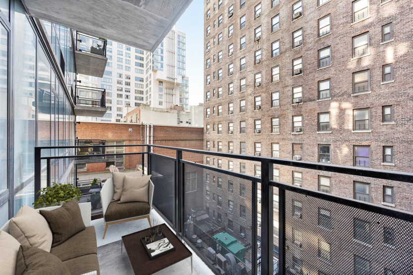 148 East 24th Street, Unit 6E Manhattan, NY 10010 - Photo 5 of 12 a living room with furniture