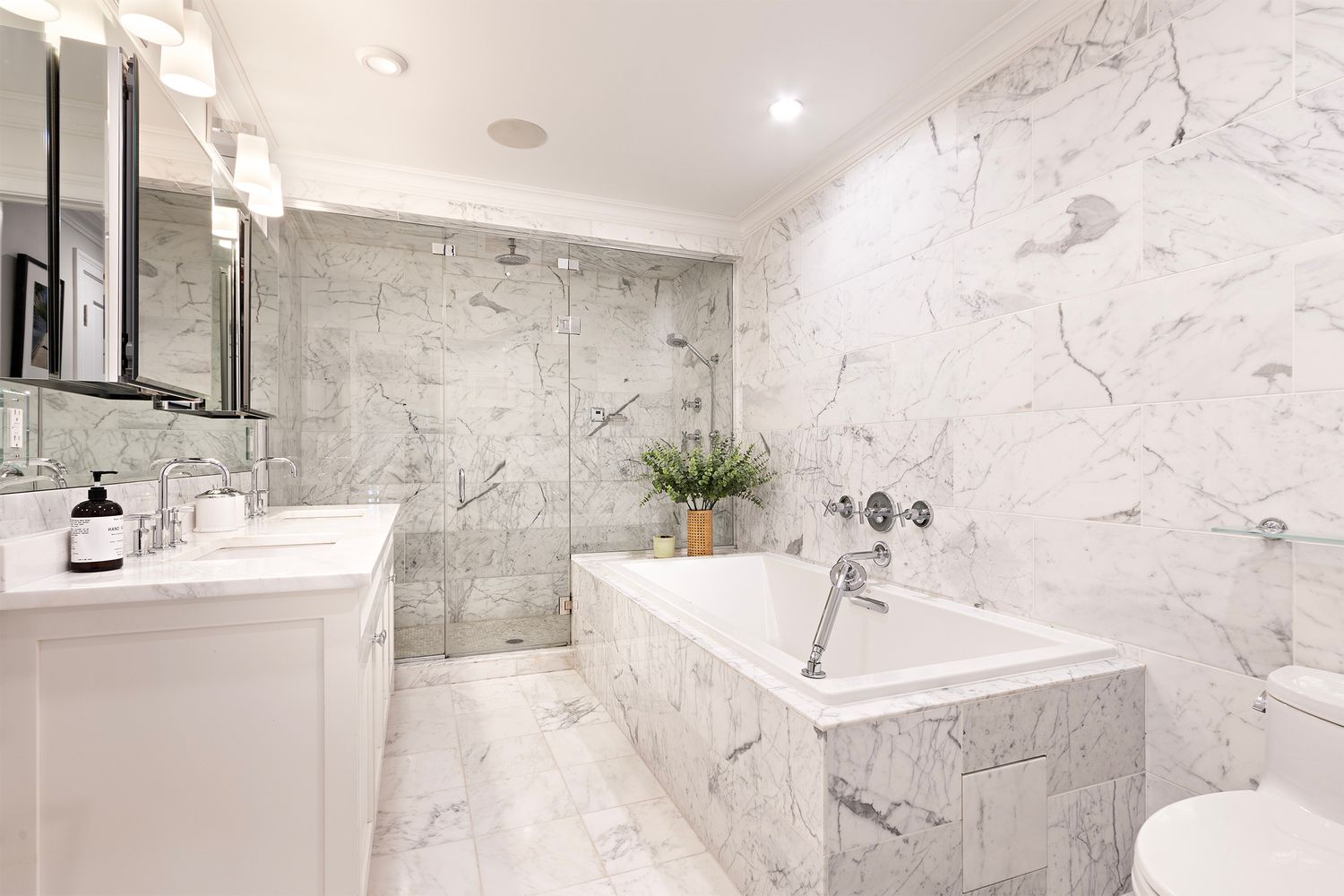 554 East 82nd Street, Unit 1/2 Manhattan, NY 10028 - Photo 5 of 13 a bathroom with a sink a toilet and bathtub