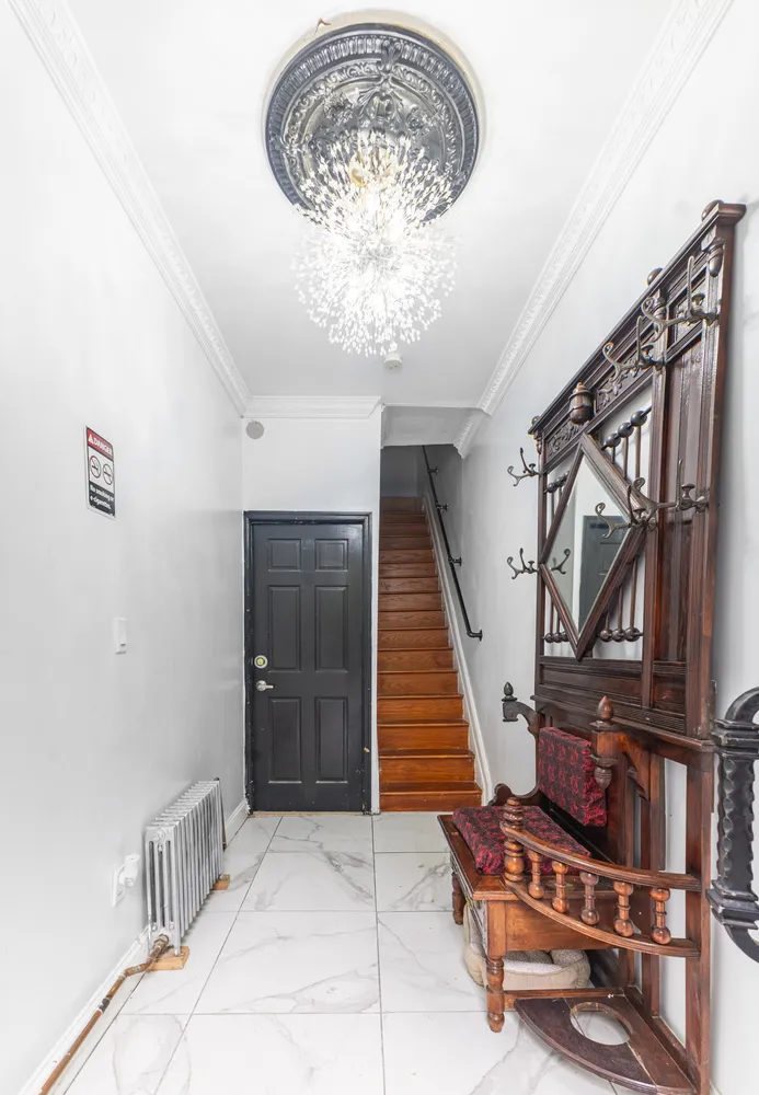 a view of entryway with a front door