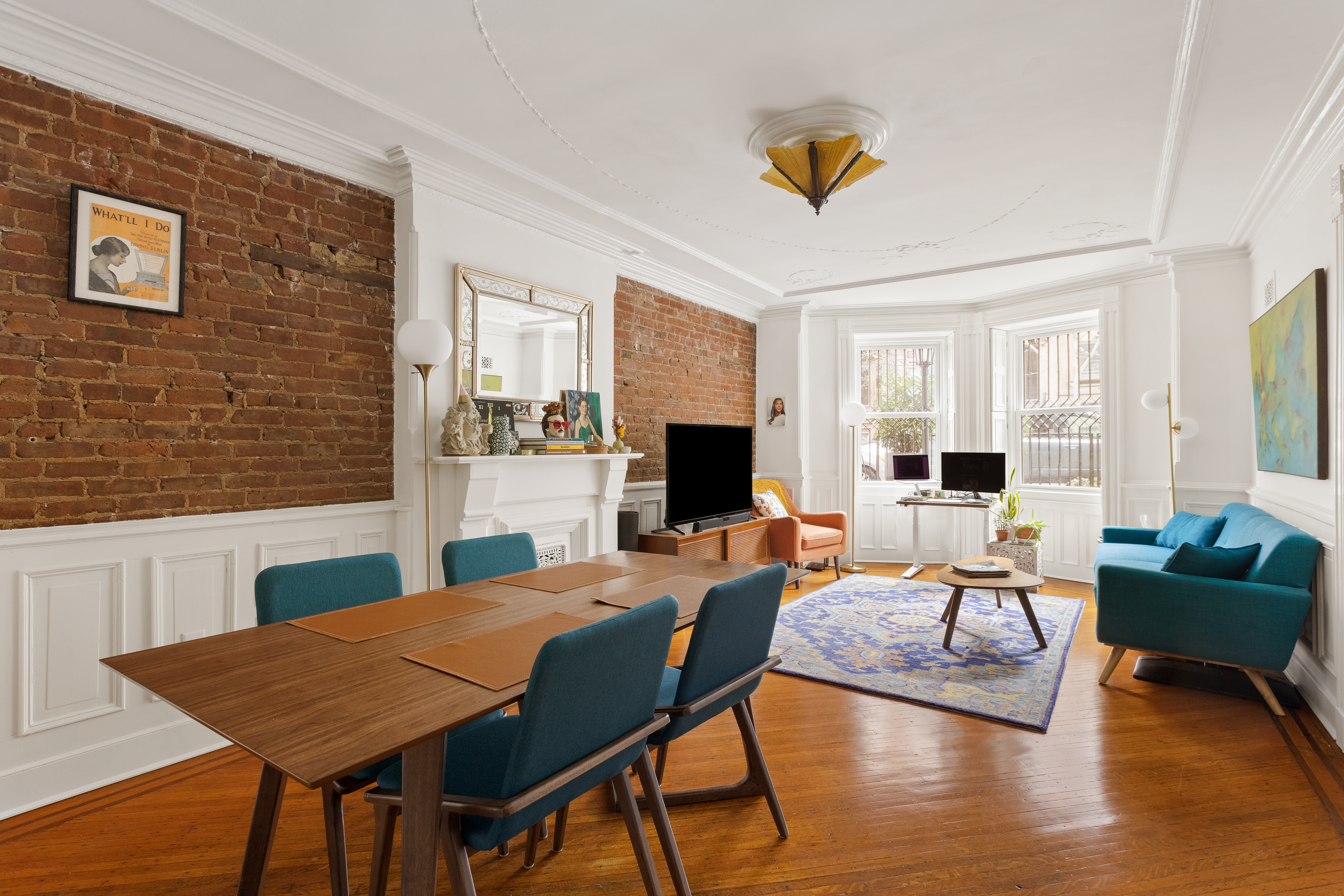 196 Berkeley Place Brooklyn, NY 11217 - Photo 20 of 25 a view of a livingroom with furniture window and wooden floor