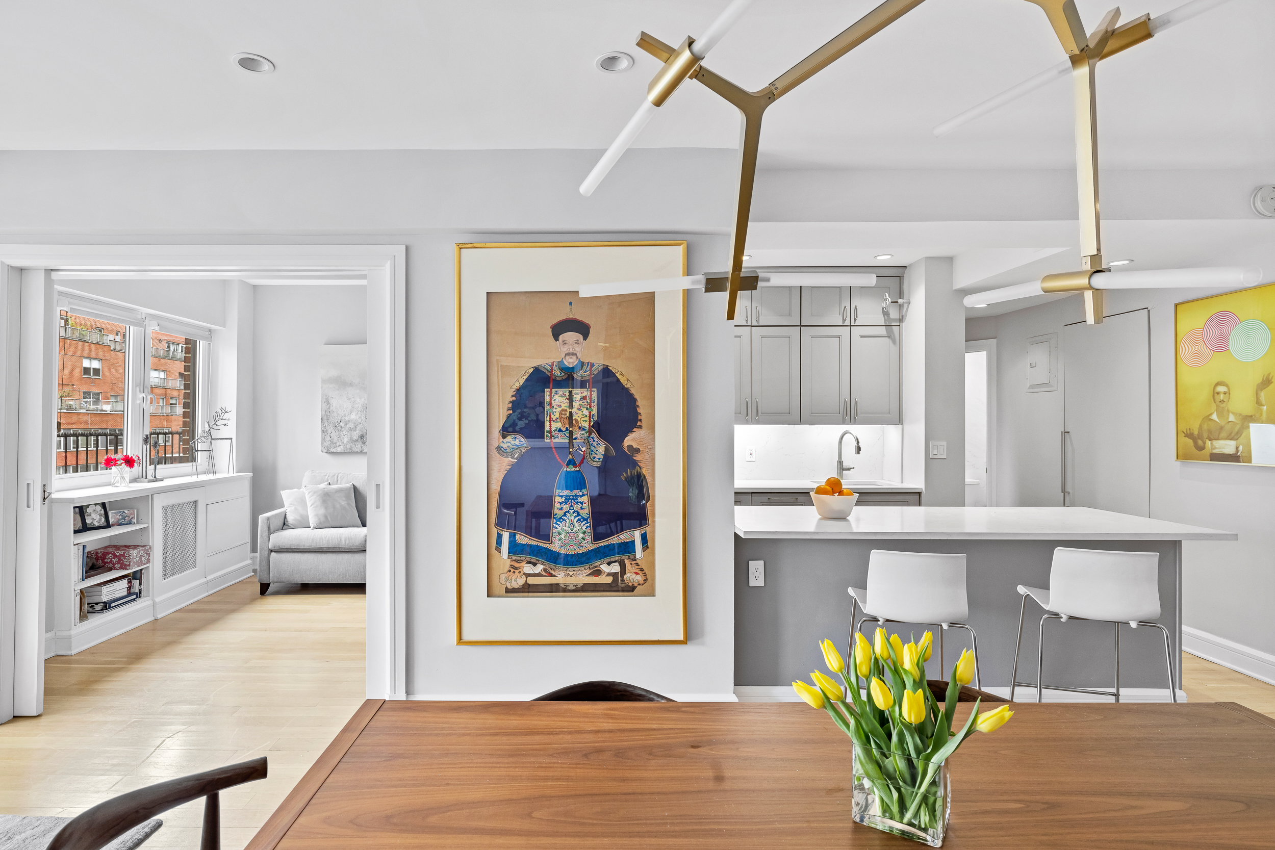 80 East End Avenue, Unit 17C Manhattan, NY 10028 - Photo 3 of 11 a living room with furniture and painting on the wall