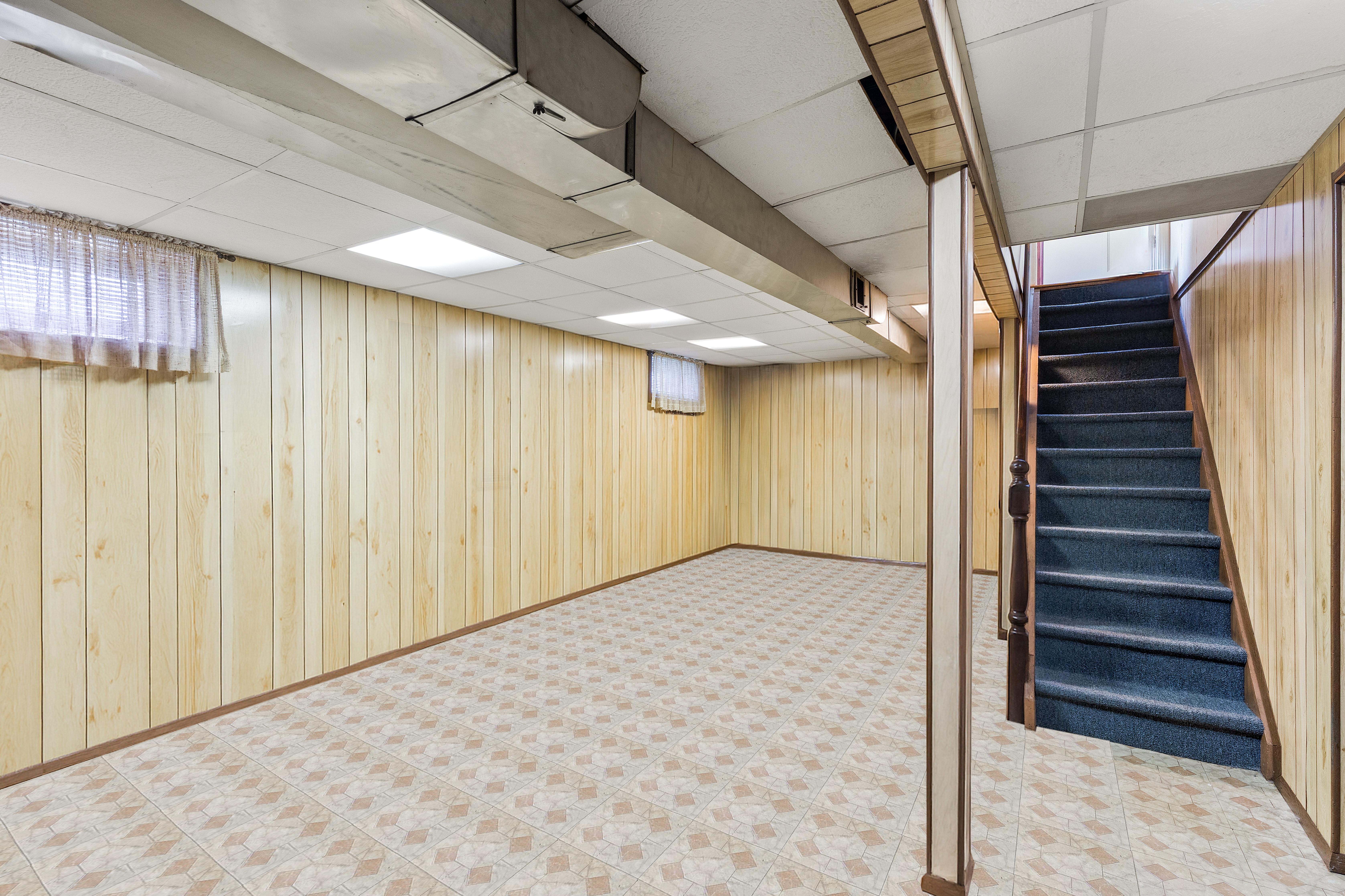 241-12 148th Avenue Queens, NY 11422 - Photo 10 of 15 a view of an empty room with wooden floor