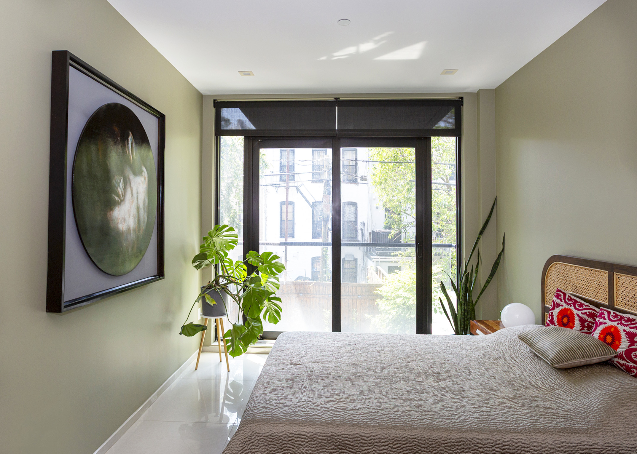 854 Putnam Avenue, Unit 2B Brooklyn, NY 11221 - Photo 11 of 12 a living room with furniture and a large window