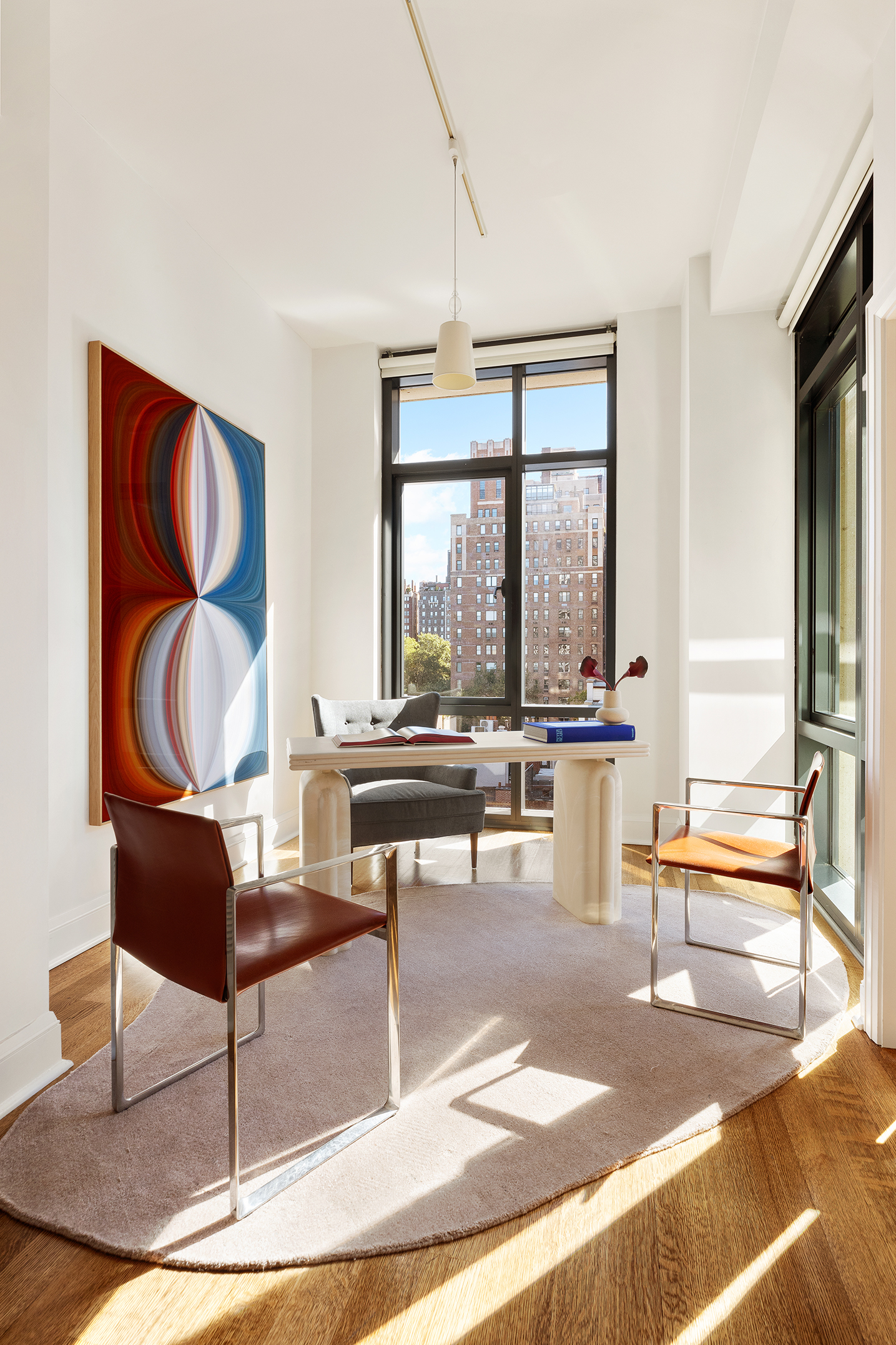 170 East End Avenue, Unit 7A Manhattan, NY 10128 - Photo 17 of 35 a living room with furniture a rug and a large window