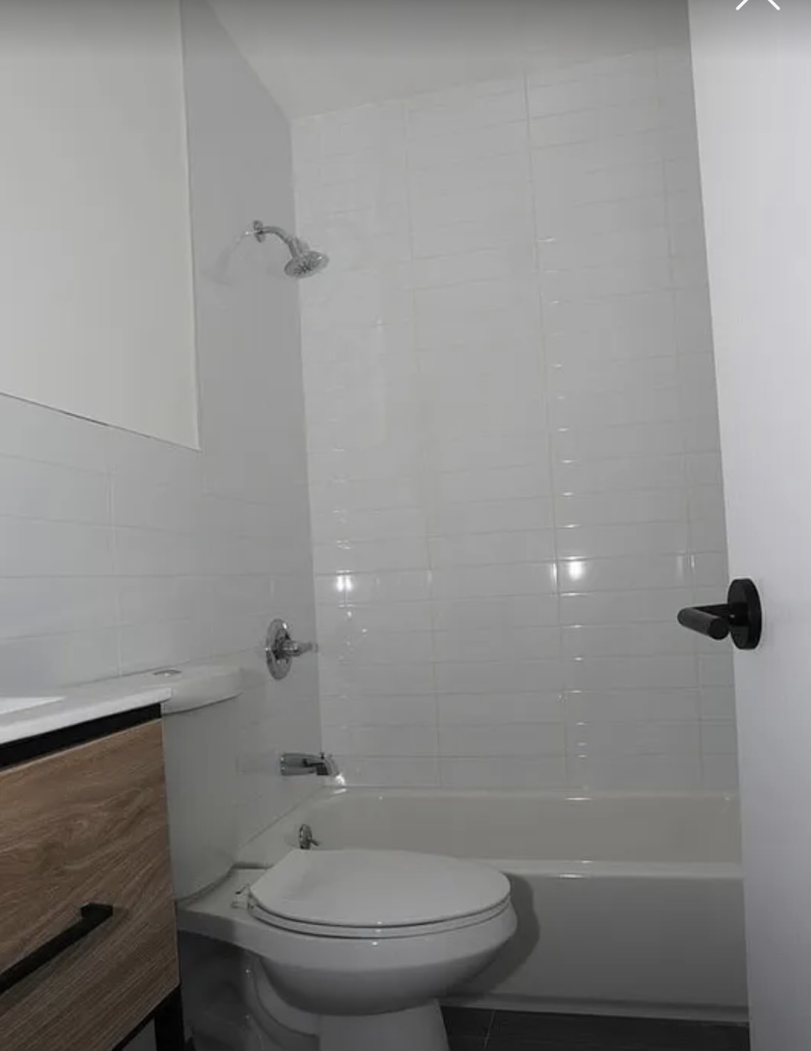 641 Hancock Street, Unit 4L Brooklyn, NY 11221 - Photo 3 of 7 a bathroom with a toilet and a shower