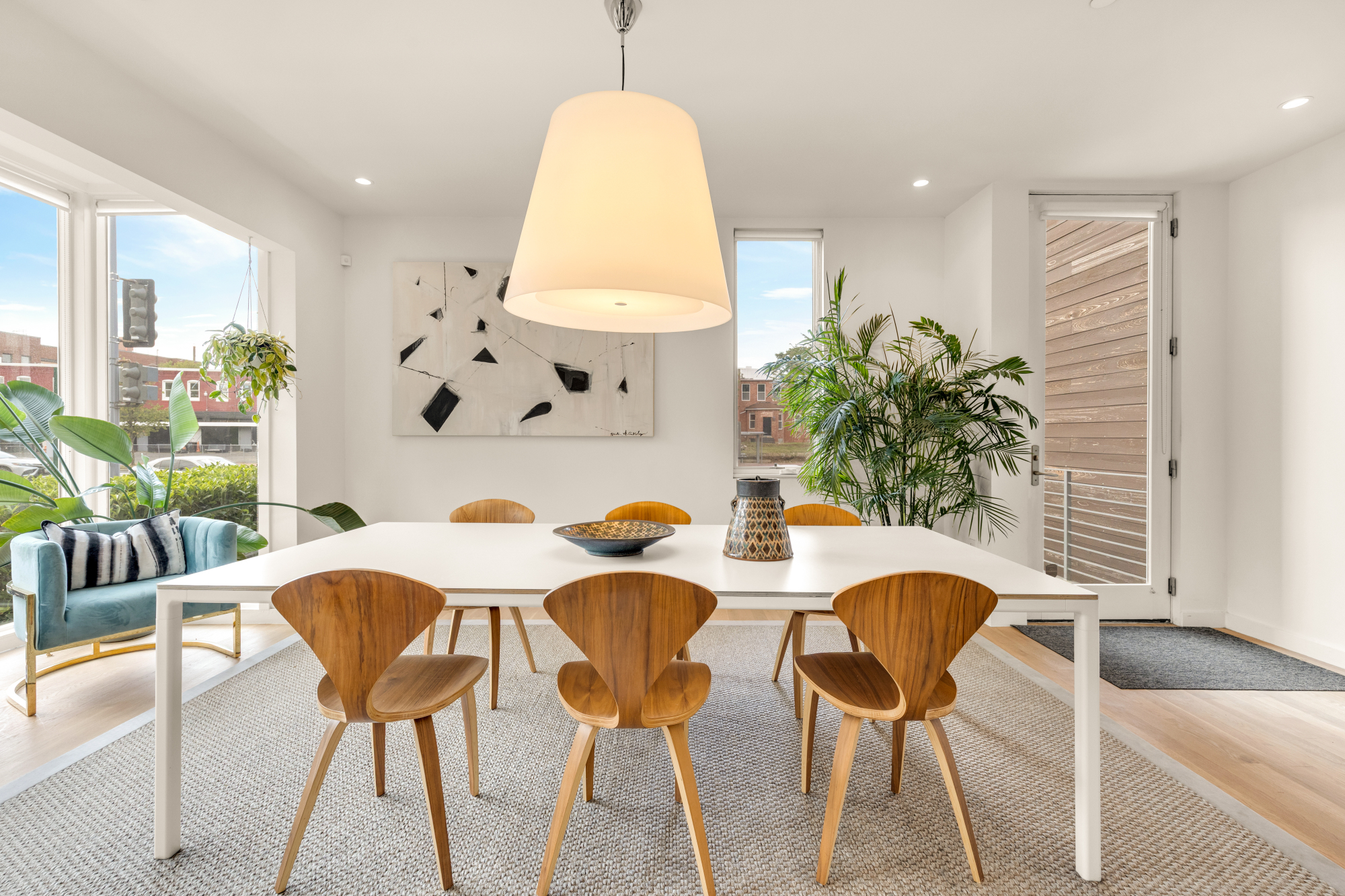 1501 4th Street Northwest, Unit 1 Washington, DC 20001 - Photo 9 of 41 a view of a dining room with furniture and a potted plant