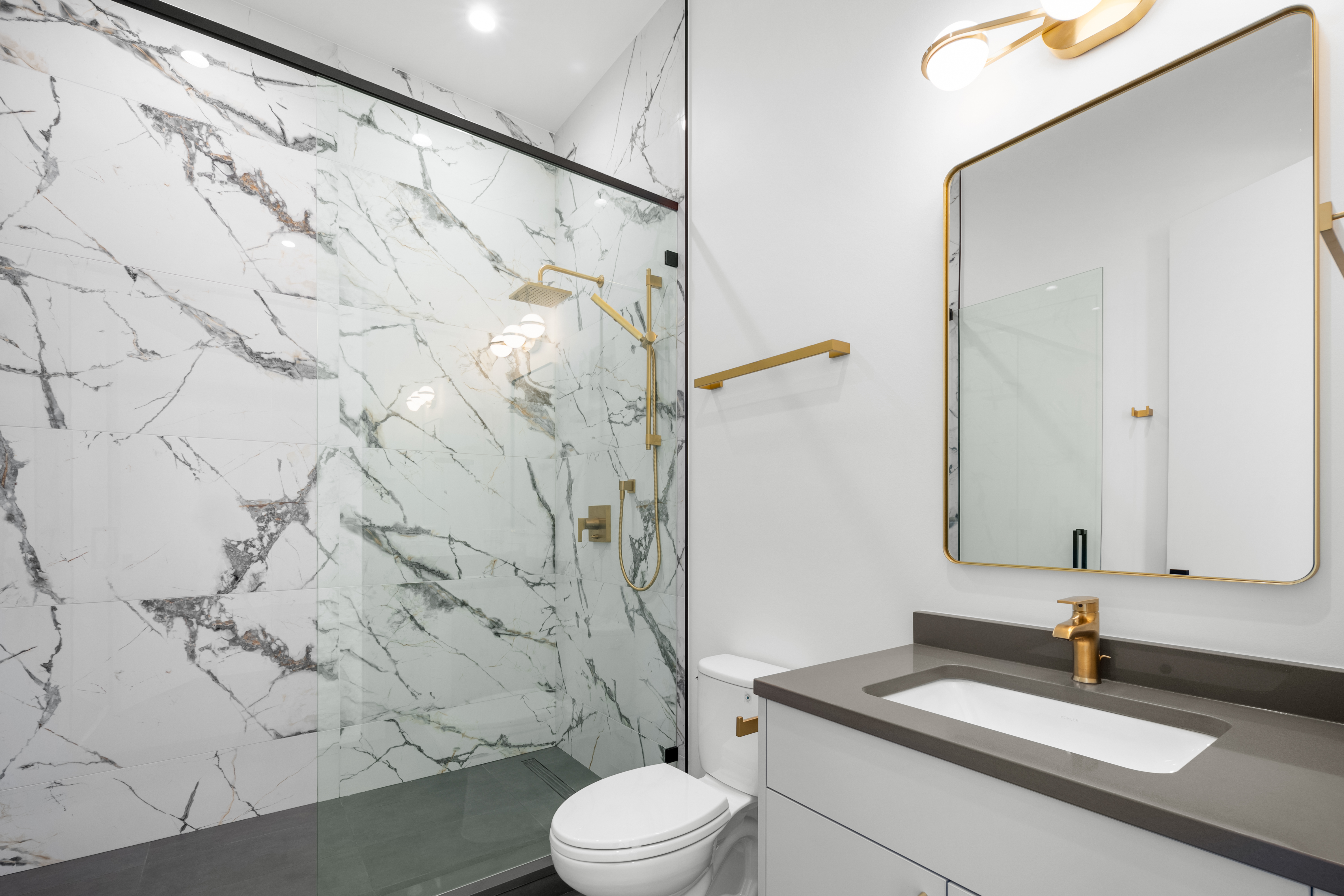 1327 West Taylor Street, Unit 4 Chicago, IL 60607 - Photo 23 of 27 a bathroom with a sink toilet and shower