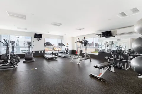 a view of a room with gym equipment