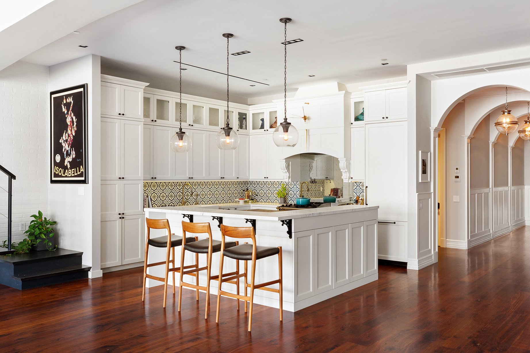 73 Wooster Street, Unit PHA Manhattan, NY 10012 - Photo 6 of 25 a kitchen with stainless steel appliances granite countertop a refrigerator a stove a sink dishwasher and white cabinets with wooden floor