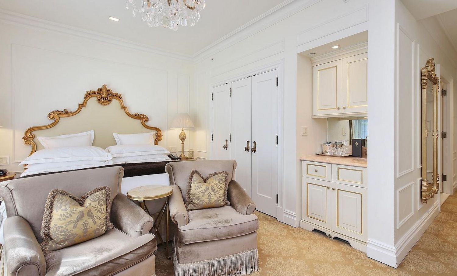 768 5th Avenue, Unit 1237 Manhattan, NY 10019 - Photo 2 of 8 a living room with furniture and a window