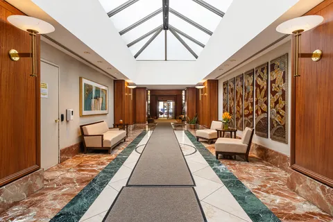 a view of a street with a building in the background