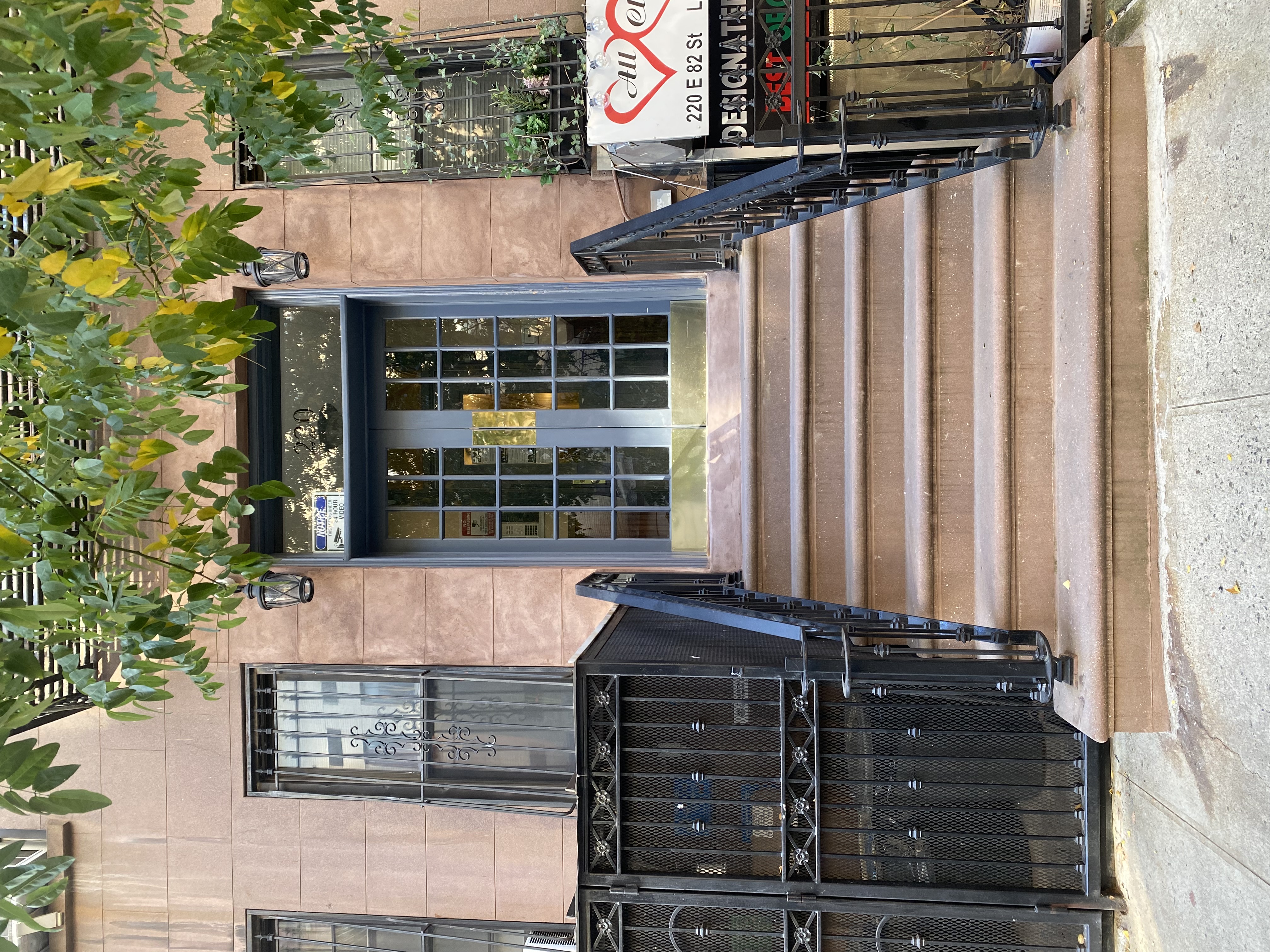 220 East 82nd Street, Unit 4RW Manhattan, NY 10028 - Photo 9 of 11 a front view of a house with entryway