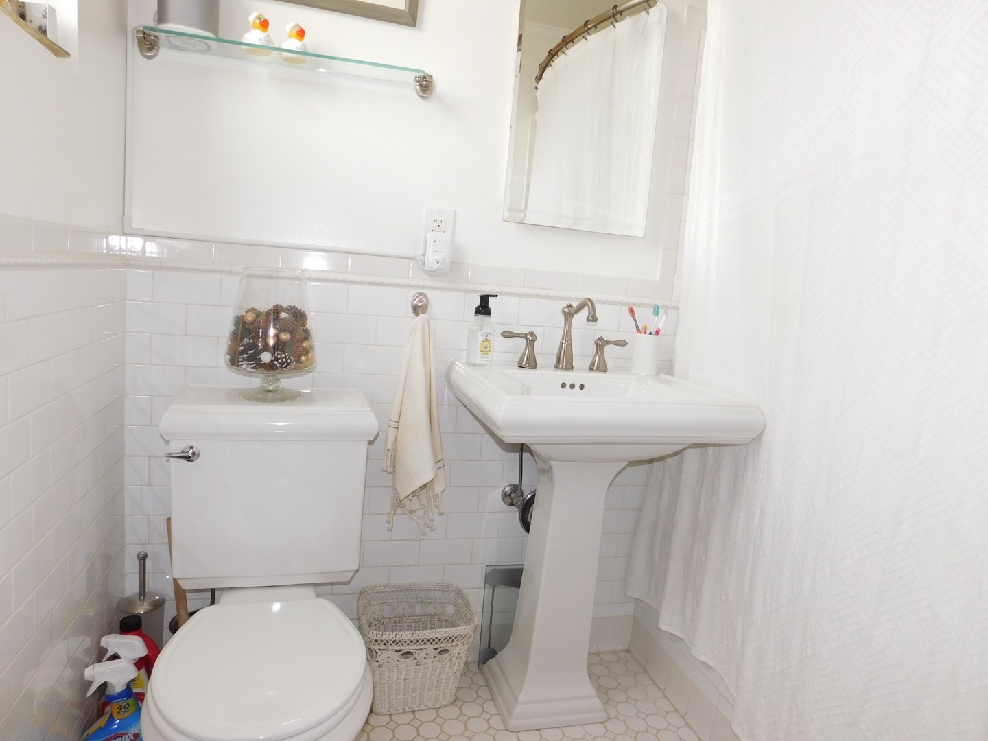132 Underhill Avenue, Unit 2 Brooklyn, NY 11238 - Photo 8 of 9 a bathroom with a sink toilet and a mirror