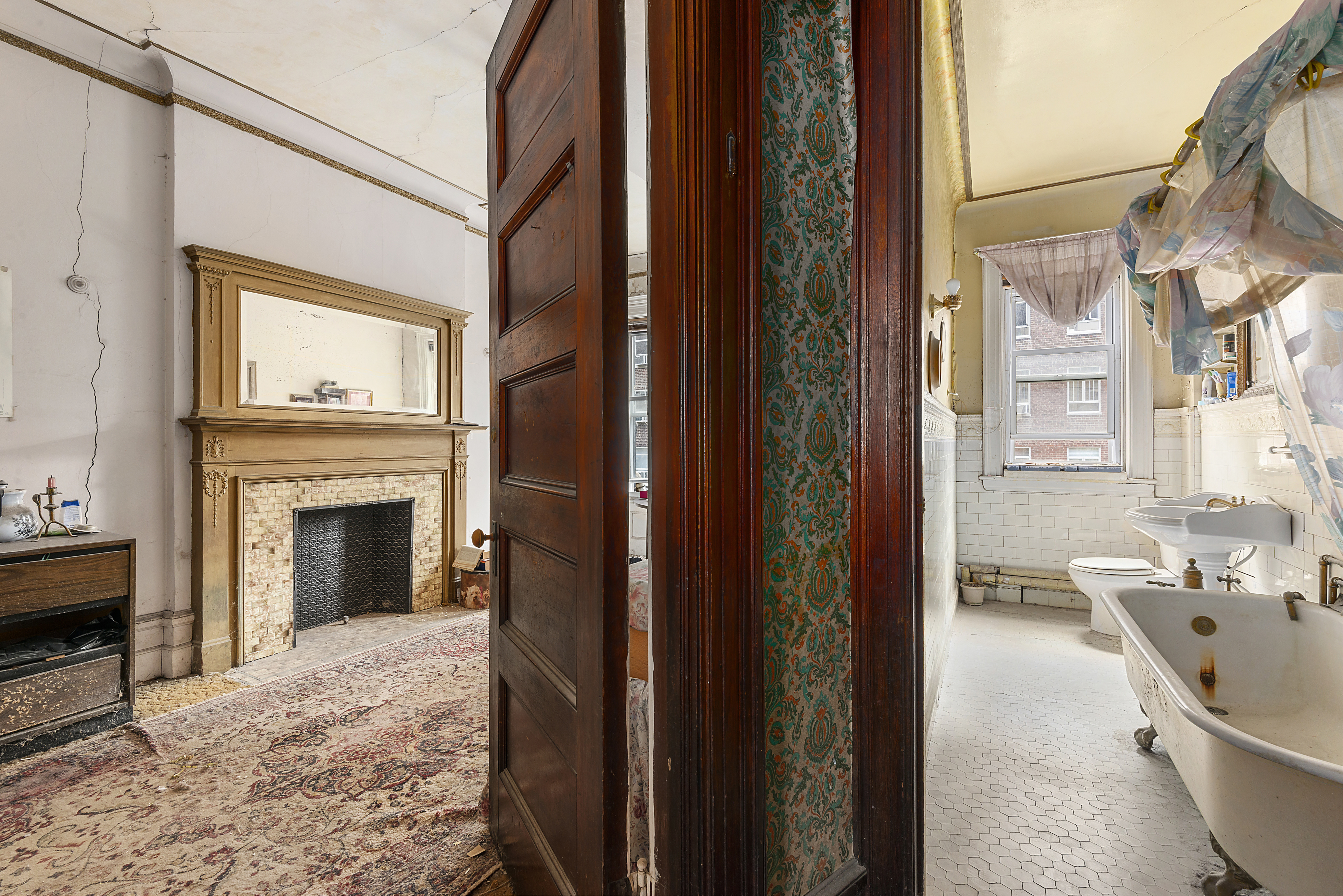 32 West 85th Street Manhattan, NY 10024 - Photo 7 of 10 a living room with furniture and a fireplace