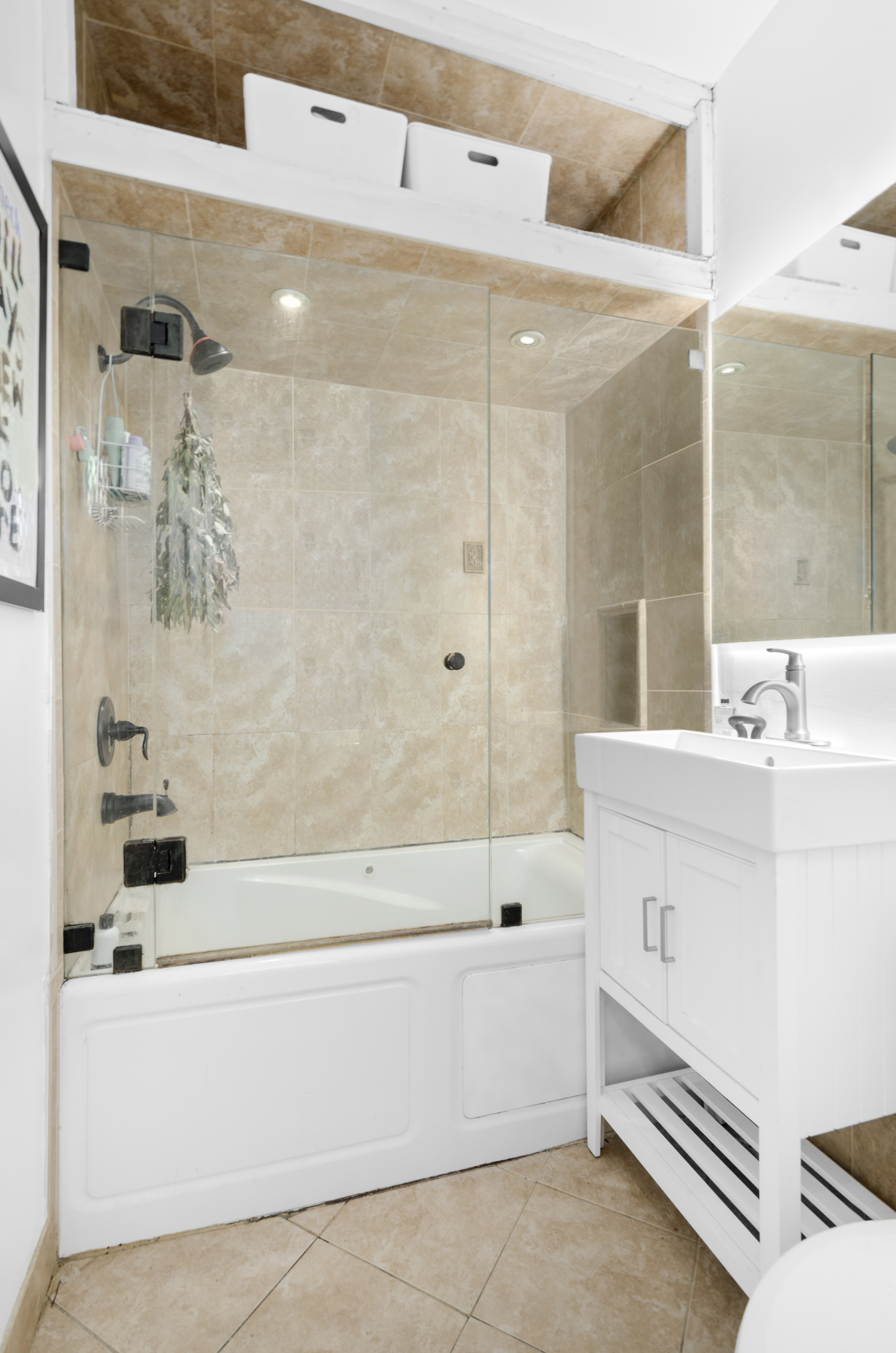 101 Linden Street, Unit 2D Brooklyn, NY 11221 - Photo 6 of 9 a bathroom with a bathtub and a sink