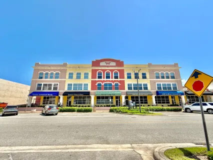 a front view of a building with street view