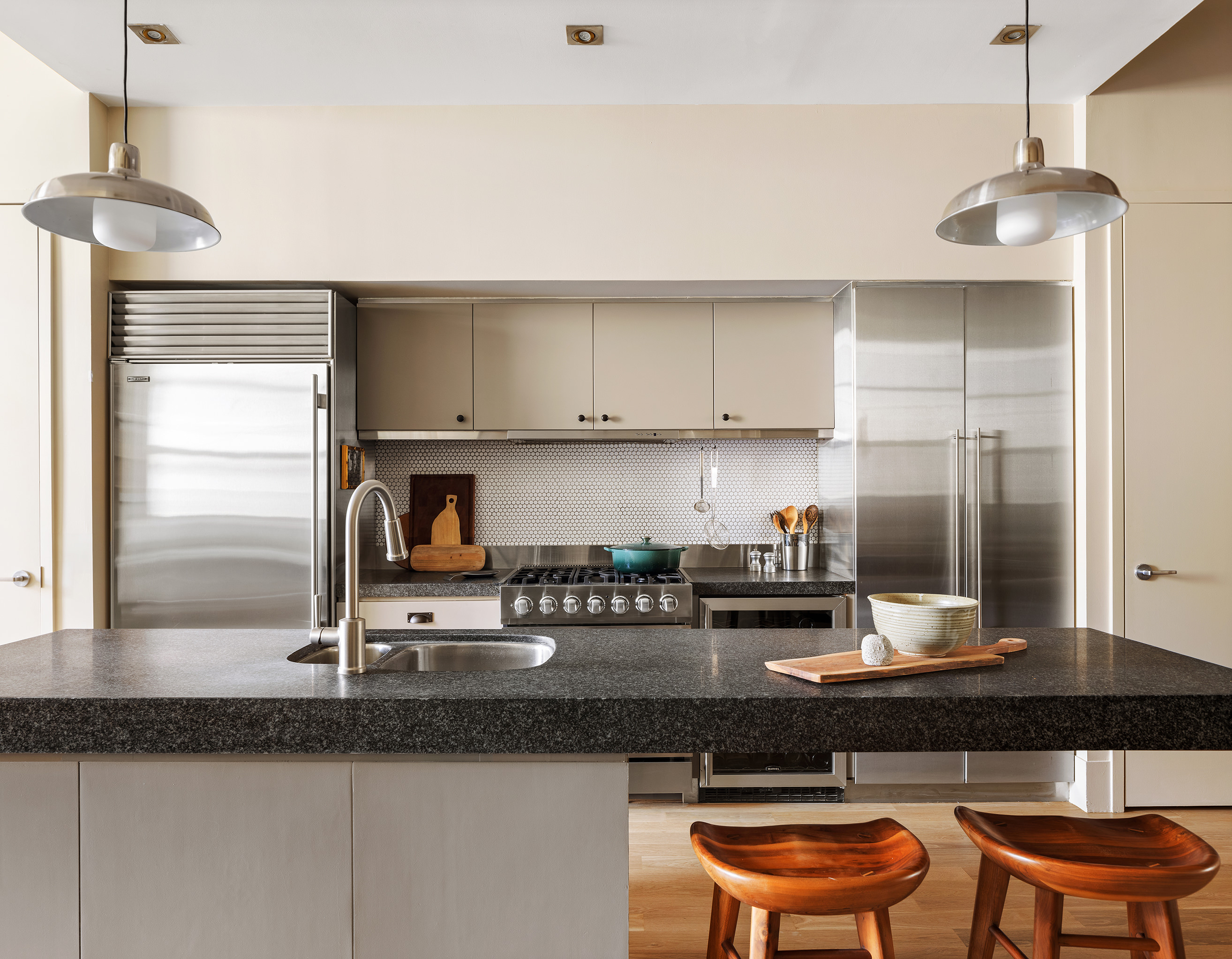 55 Berry Street, Unit 3D Brooklyn, NY 11249 - Photo 2 of 12 a kitchen with a sink and cabinets