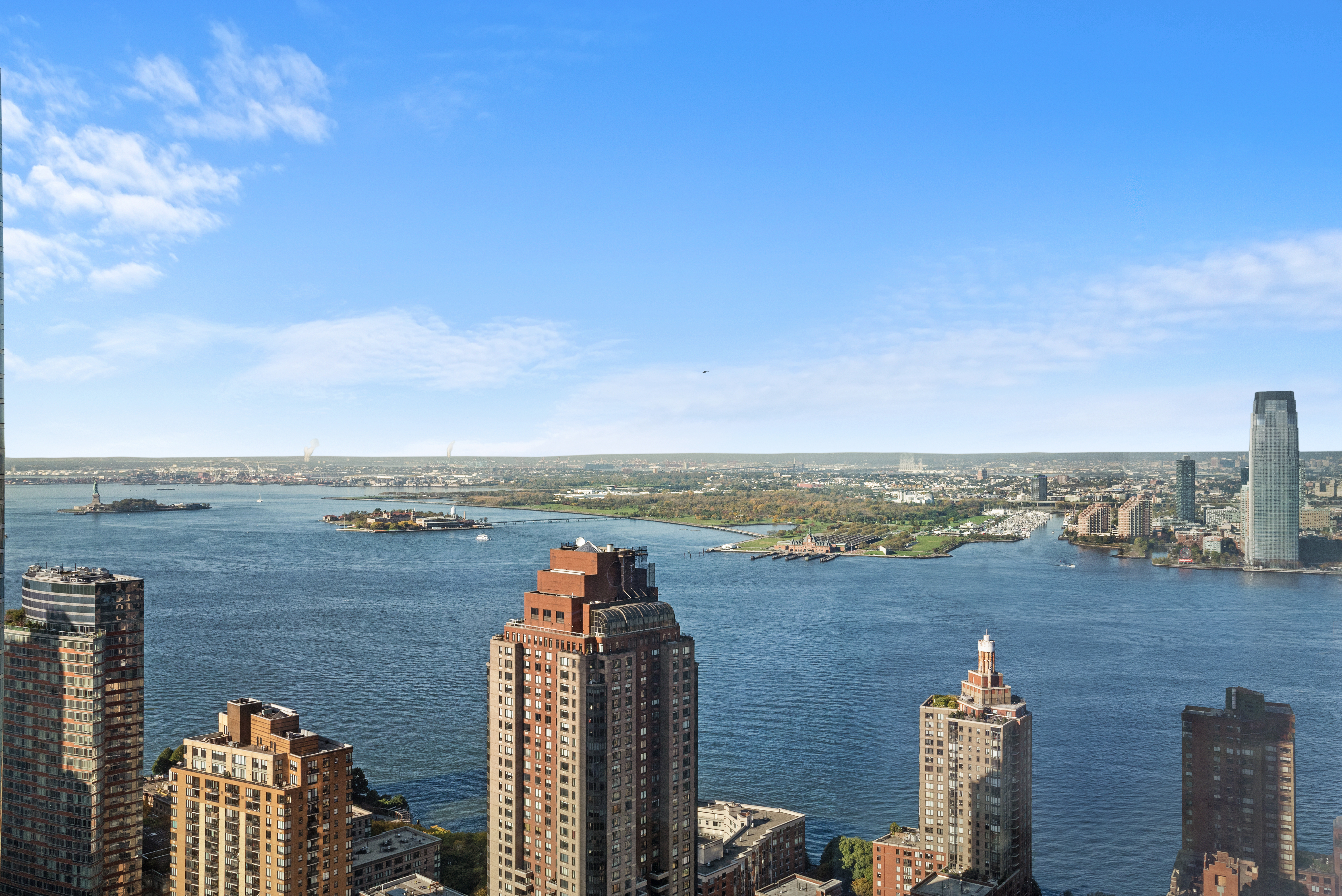 123 Washington Street, Unit 49G Manhattan, NY 10006 - Photo 7 of 11 a view of a city and a lake