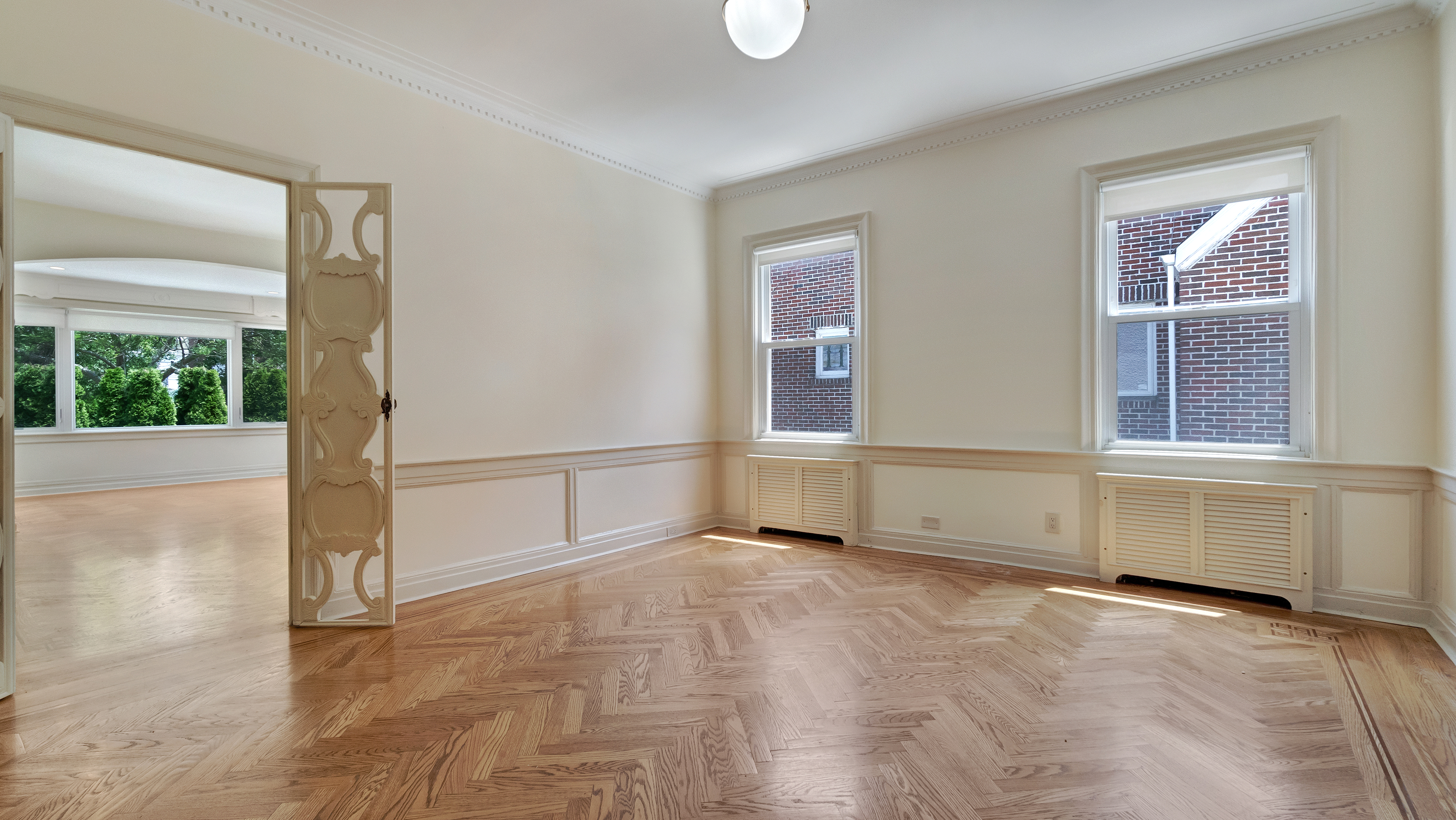 278 Amherst Street Brooklyn, NY 11235 - Photo 4 of 24 an empty room with windows