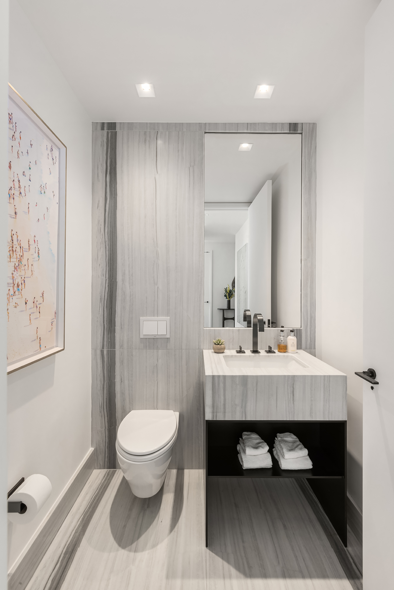 111 Murray Street, Unit 38A Manhattan, NY 10007 - Photo 14 of 29 a bathroom with a sink a toilet and a mirror