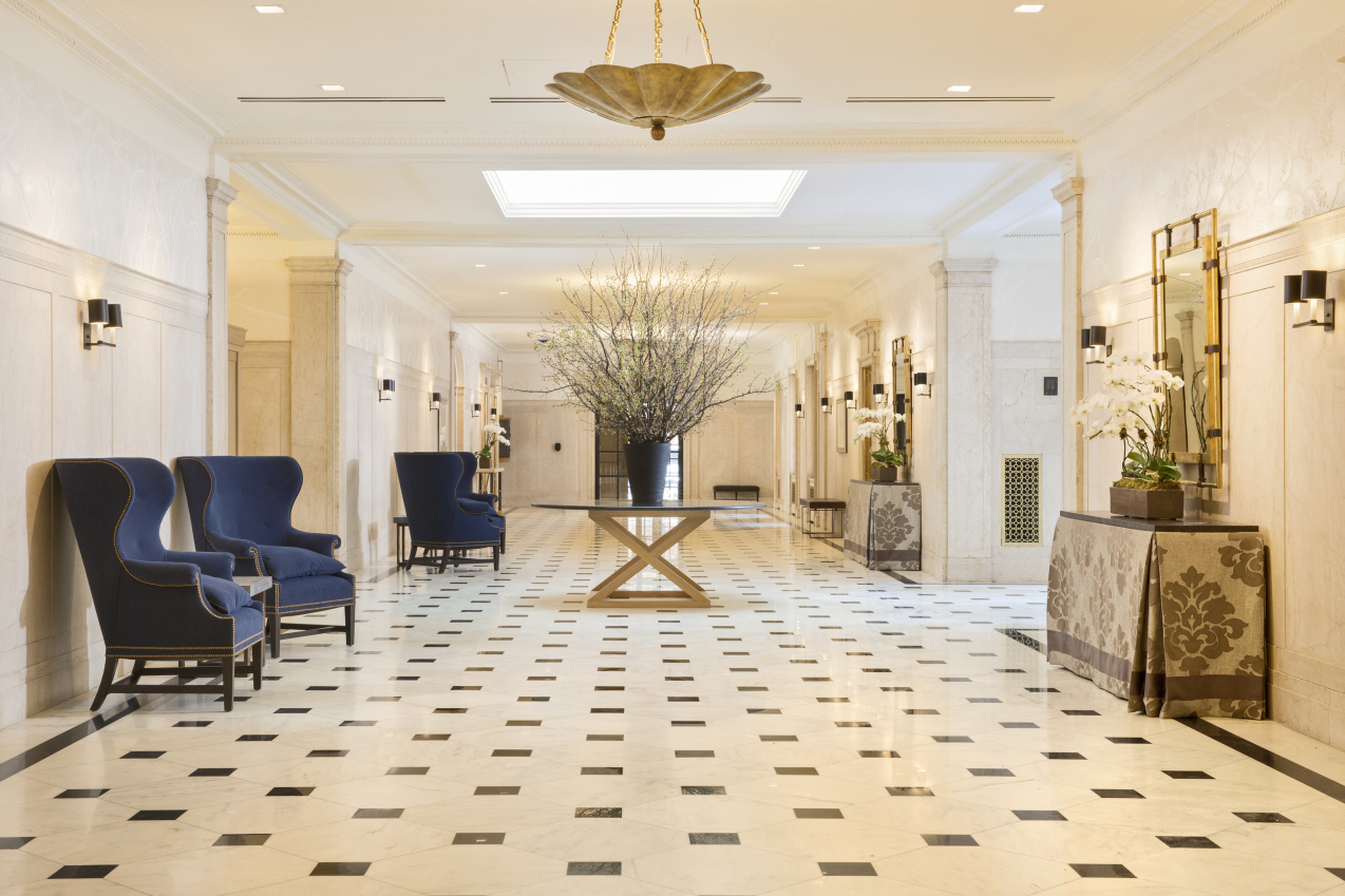 141 East 88th Street, Unit 7A Manhattan, NY 10128 - Photo 9 of 16 a living room filled with furniture