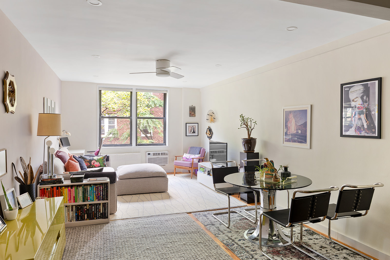 275 Webster Avenue, Unit 5I Brooklyn, NY 11230 - Photo 3 of 7 a living room with furniture and a window