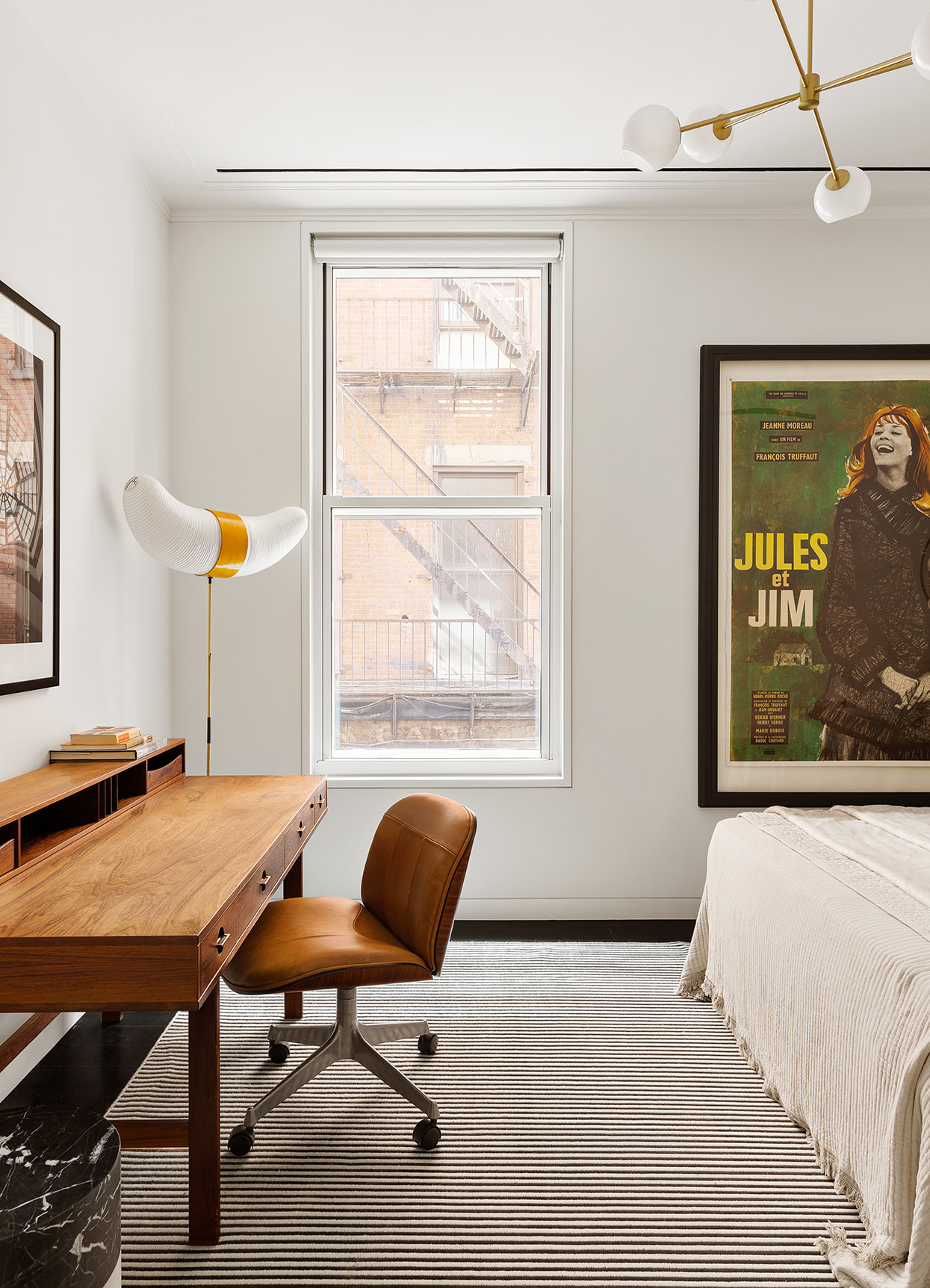 7 Harrison Street, Unit ATELIER Manhattan, NY 10013 - Photo 17 of 24 a view of a workspace with furniture and a window