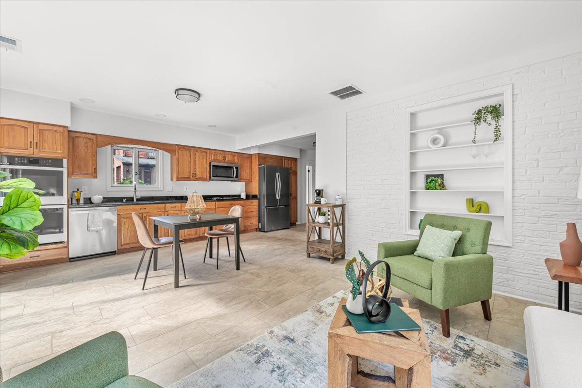1902 Rookwood Road Silver Spring, MD 20910 - Photo 11 of 36 a living room with furniture and a table