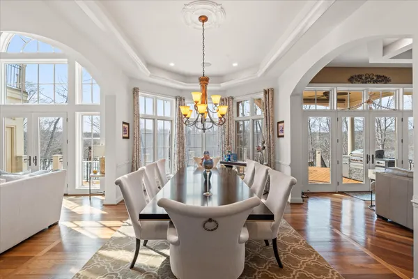 a kitchen with stainless steel appliances granite countertop a sink a stove and a microwave