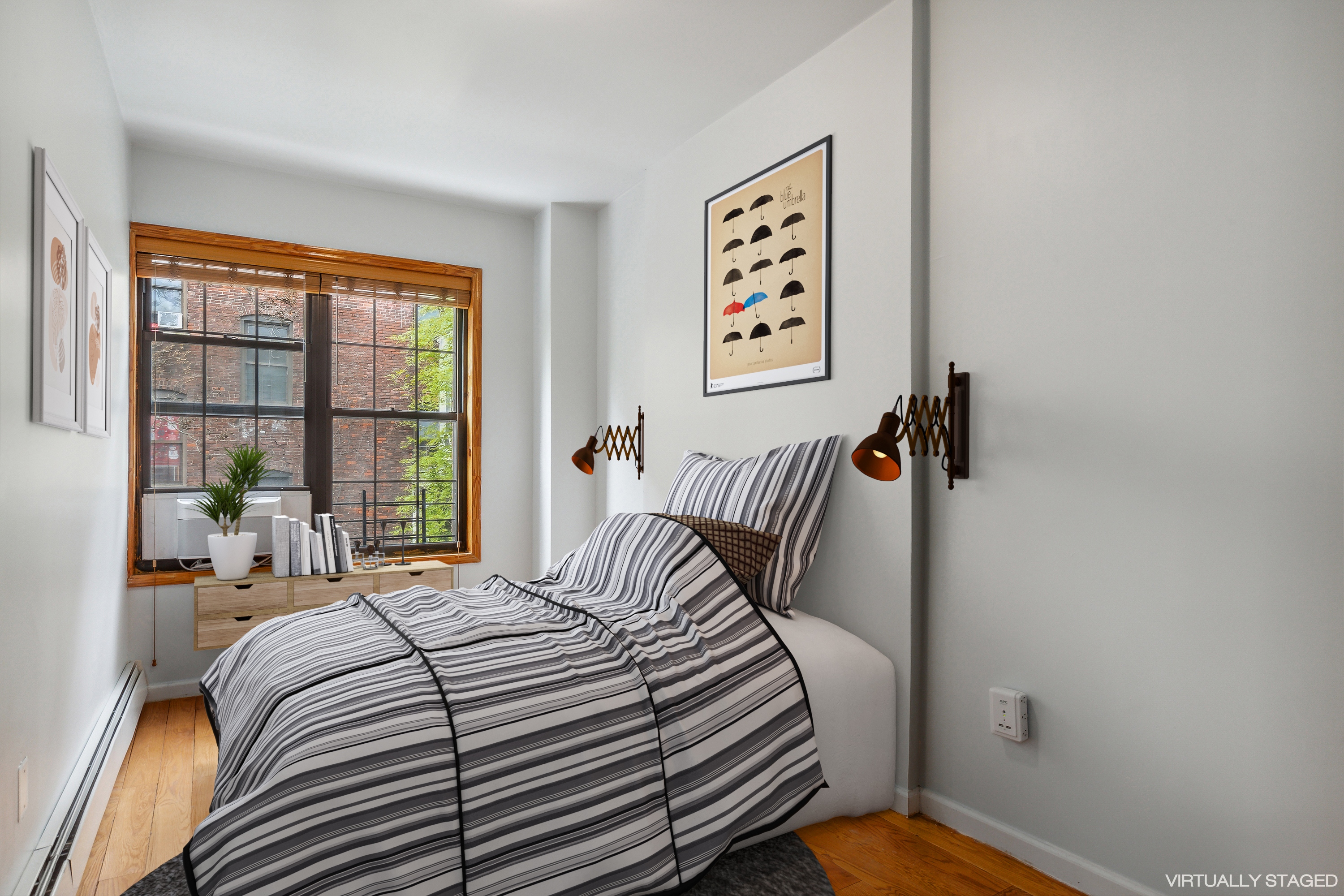 530 West 175th Street, Unit 2 Manhattan, NY 10033 - Photo 6 of 12 a bedroom with a bed and a window