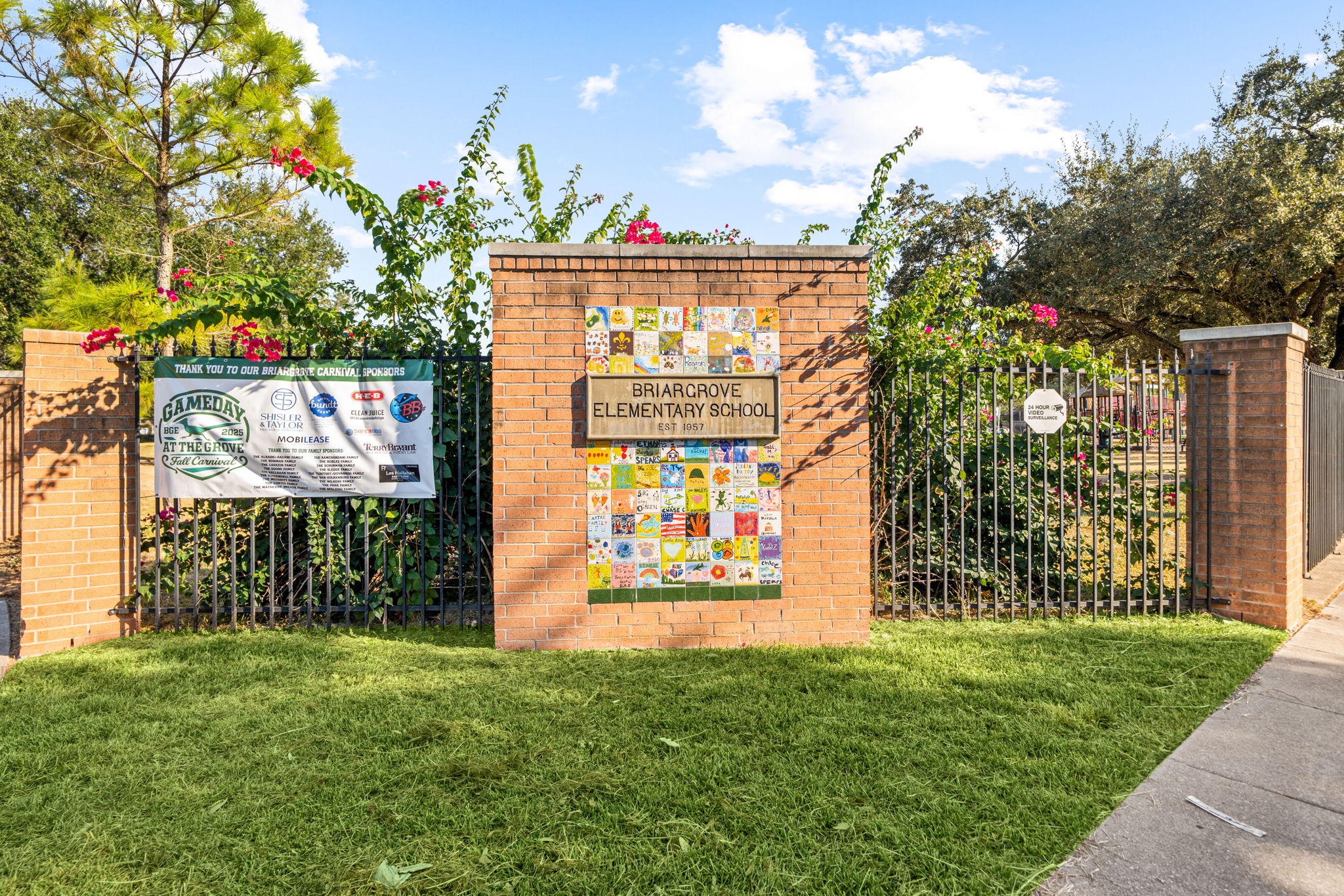 6213 Overbrook Lane Houston, TX 77057 - Photo 22 of 27 a sign that is sitting in front of a house with a big yard
