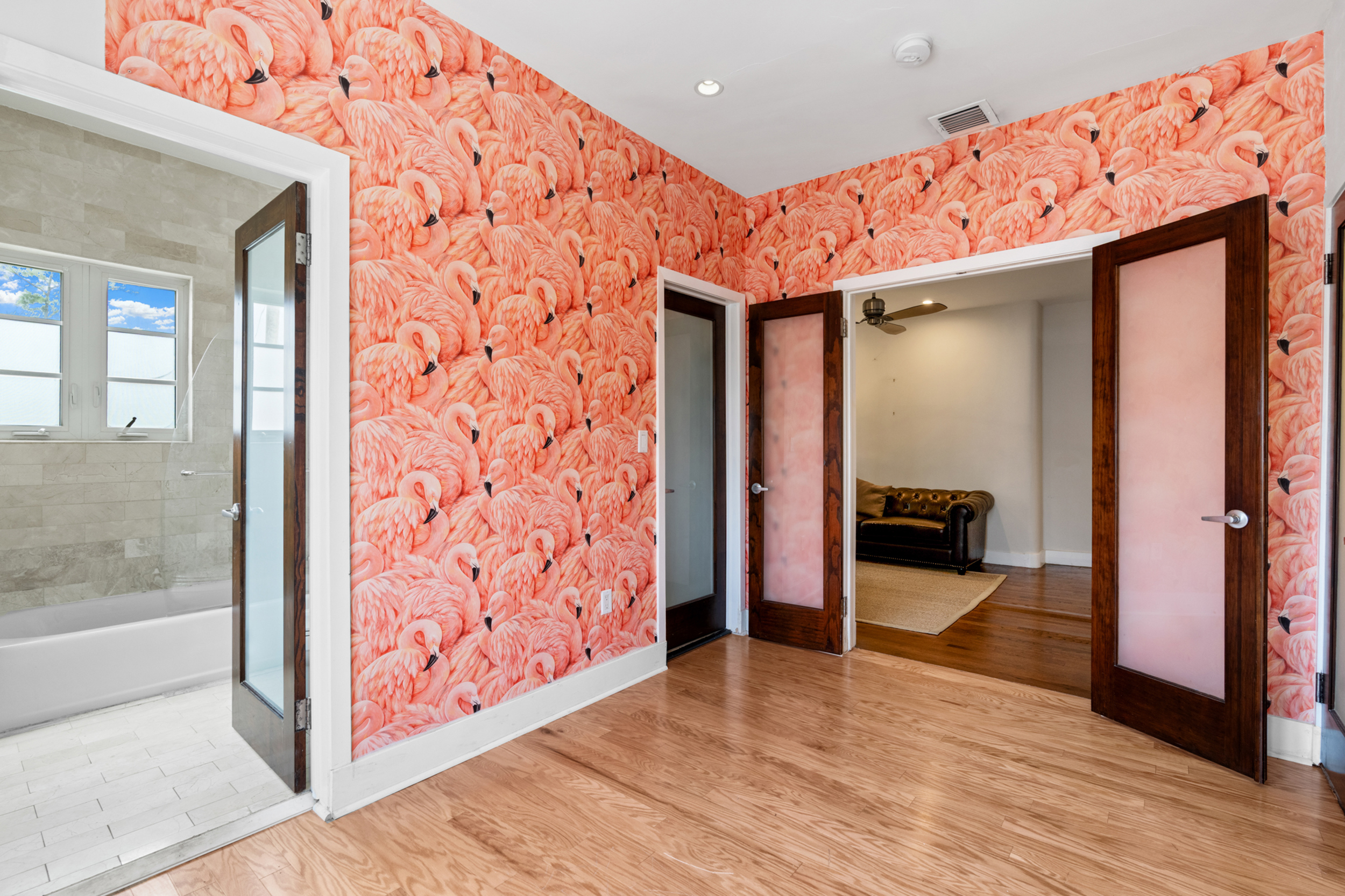 711 East 14th Street, Unit 7 Hialeah, FL 33010 - Photo 23 of 36 a view of a hallway with wooden floor and furniture